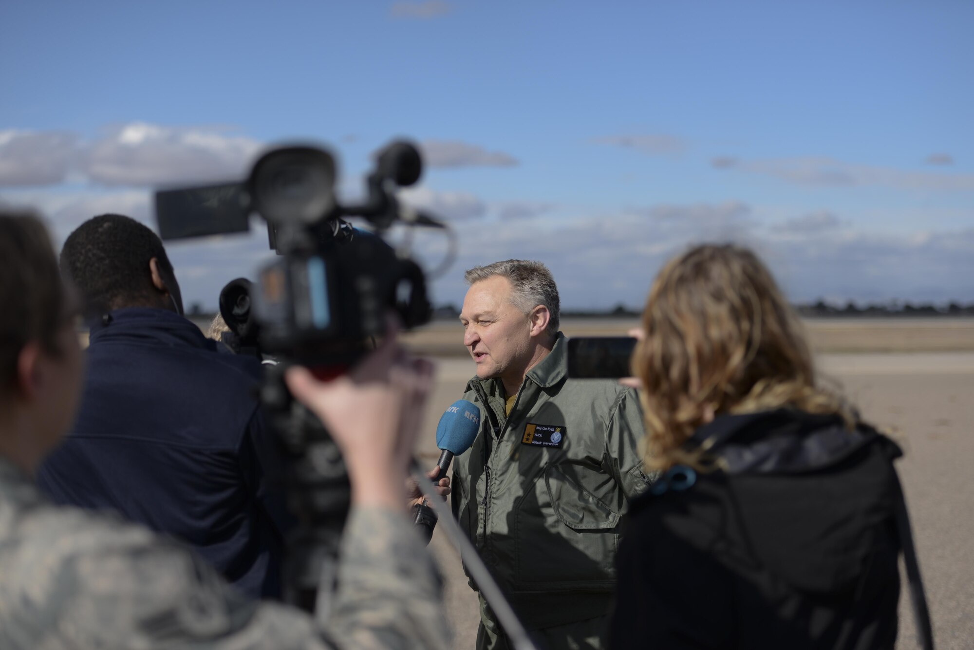 Maj. Gen. Per-Egil Rygg, Chief of Staff of the Royal Norwegian Air Force, conducts an interview for members of the press, Dec. 14, 2015, at Luke Air Force Base. Rygg discussed the significance of the first flight of a Norwegian F-35 by a Norwegian pilot, Maj. Morten Hanche. (U.S. Air Force photo by Airman 1st Class Ridge Shan)