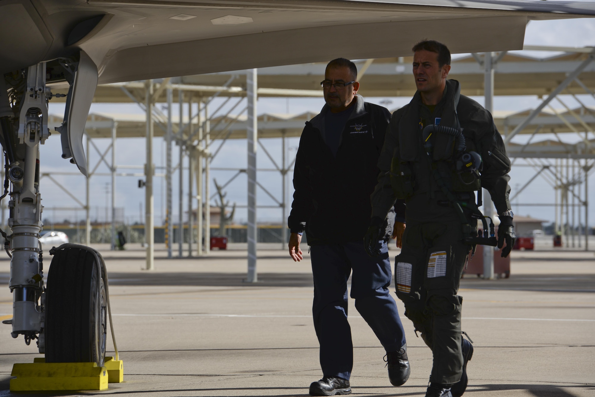 Norwegian Maj. Morten Hanche, 62nd Fighter Squadron F-35 student pilot, inspects the exterior of his aircraft before boarding it, Dec. 14, 2015, at Luke Air Force Base. Hanche reported that the flight went smoothly and without error. (U.S. Air Force photo by Airman 1st Class Ridge Shan)