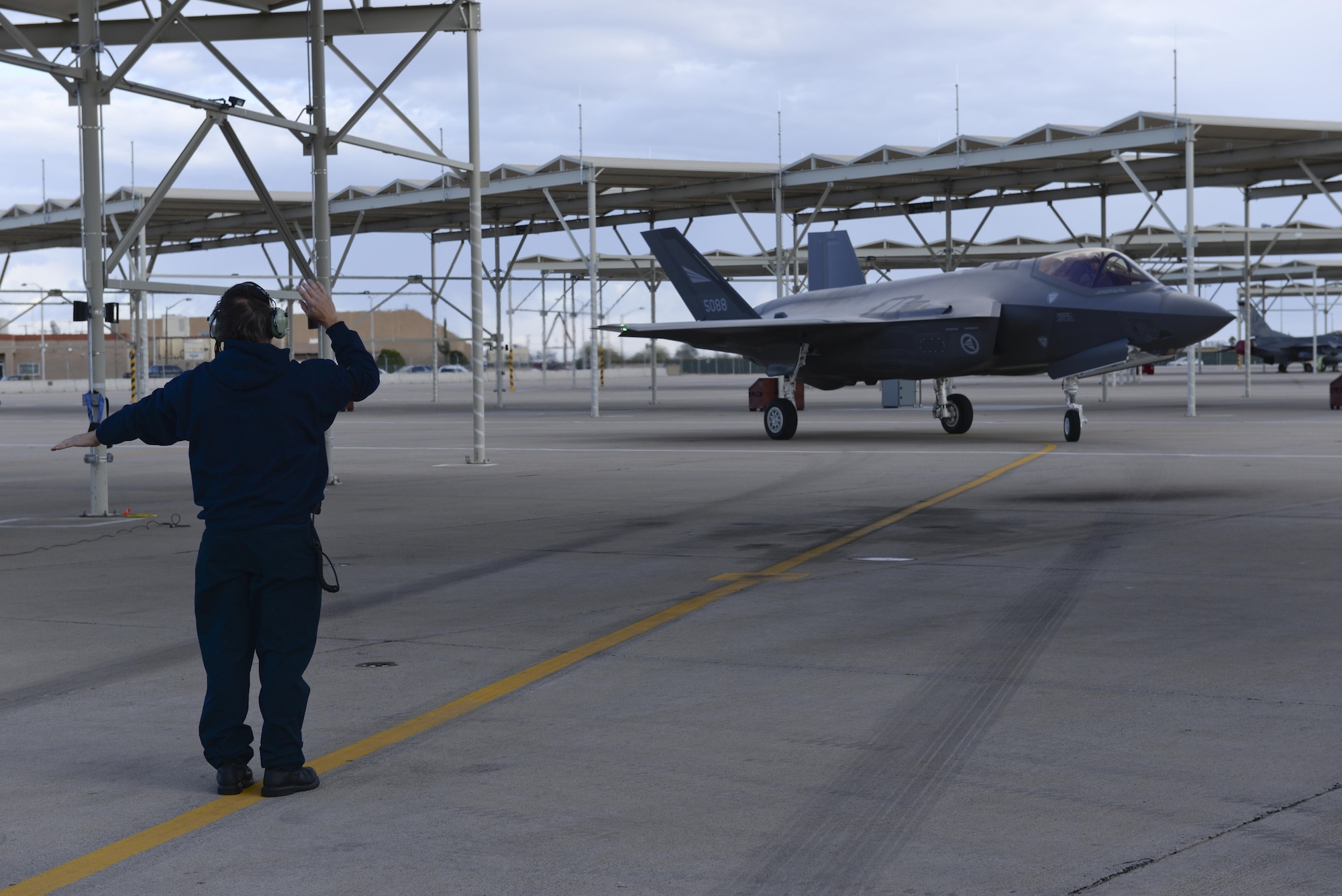An F-35 Lightning II piloted by Royal Norwegian Air Force Maj. Morten Hanche, a 62nd Fighter Squadron F-35 student pilot, taxis to rest on the flightline after a successful sortie Dec. 14, 2015, at Luke Air Force Base, Ariz. Hanche is the first Norwegian to fly an F-35, and is now the first Norwegian to have piloted a Norwegian-specific F-35. (U.S. Air Force photo/Airman 1st Class Ridge Shan)