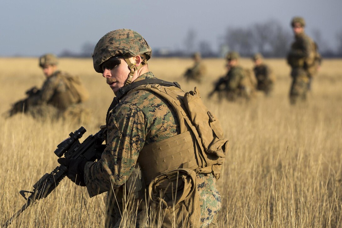 U.S. Marines conduct field training with Romanian and Moldovan armed forces during Platinum Lynx 16-2 at Smardan Training Area, Romania, Dec. 9, 2015. Exercise Platinum Lynx 16-2 is a NATO-led multinational exercise designed to strengthen combat readiness, improve collective capabilities and maintain proven relationships with allied and partner nations. U.S. Marine Corps photo by Lance Cpl. Melanye E. Martinez