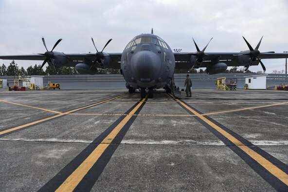 Staff Sgt. Derek Watson, a special missions aviator with the 1st Special Operations Group Detachment 2, inspects an MC-130J Commando II during a preflight check at Lockheed Martin in Marietta, Ga., Dec. 11, 2015.  The MC-130J will undergo modifications to become an AC-130J Ghostrider, which will provide the 1 SOW with close air support and air interdiction capabilities. (U.S. Air Force photo by Senior Airman Ryan Conroy)