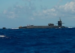 150324-N-EF657-076 APRA HARBOR, Guam (March 24, 2015) Marines from the 3rd Marine Reconnaissance Battalion prepare to disembark the guided-missile submarine USS Michigan (SSGN-727) during a small boat exercise in Apra Harbor. The Marines, based in Okinawa, Japan, worked with the Navy to practice small boat deployment. (U.S. Navy photo by Mass Communication Specialist 1st Class Timothy Wilson/Released)