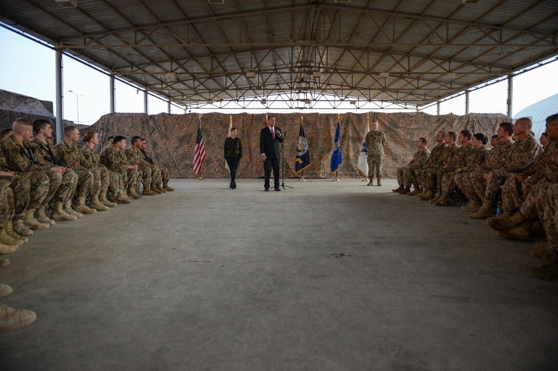 U.S. Defense Secretary Ash Carter, his wife, Stephanie, and Army Lt. Gen. Sean MacFarland speak with troops in Baghdad, Dec. 16, 2015. DoD photo by Army Sgt. 1st Class Clydell Kinchen