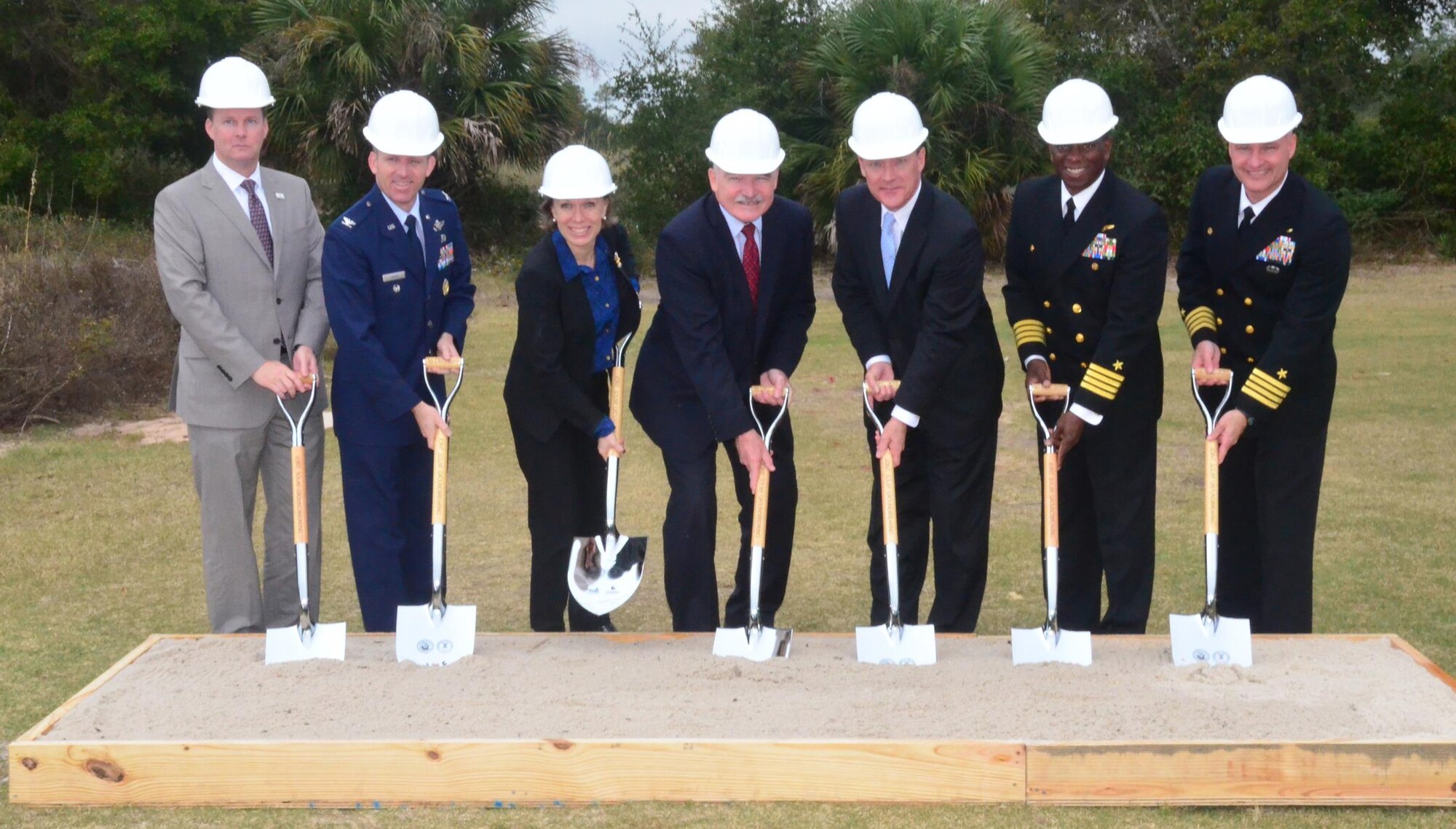 Matthew Hantzmon (left), the chief operating officer of Coronal Development; Col. Matthew W. Higer, the vice commander of the 96th Test Wing, Eglin Air Force Base, Fla.; Miranda A.A. Ballentine, the assistant secretary of the Air Force for installations, environment and energy; Dennis V. McGinn, the assistant secretary of the Navy for energy, installations and environment; Stan Connally, the president and CEO of Gulf Power; Capt. Keith W. Hoskins, the commanding officer, Naval Air Station Pensacola, Fla.; and Capt. Todd A. Bahlau, the commanding officer, NAS Whiting Field, Fla., broke ground Dec. 16, 2015, at a ceremony at NAS Pensacola, marking the start of construction for three large-scale solar electric generating facilities.  (U.S. Navy photo/Mike O'Connor)