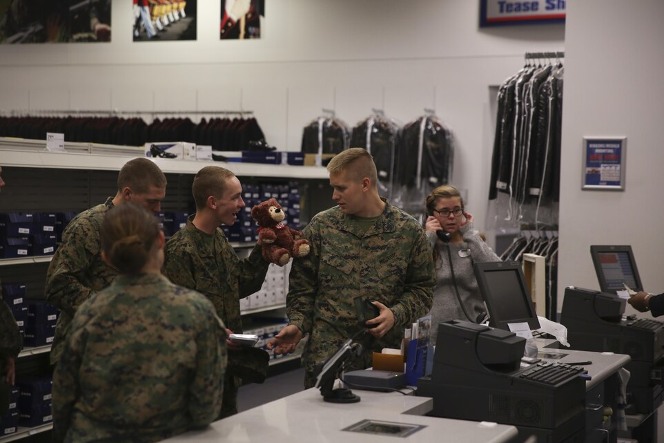 Basic Academy of International Studies Marine Corps Junior Reserve Officers Training Corps cadets shop at the Marine Corps Post Exchange during a tour of the Combat Center, Dec. 4, 2015. (Official Marine Corps photo by Cpl. Medina Ayala-Lo/Released)