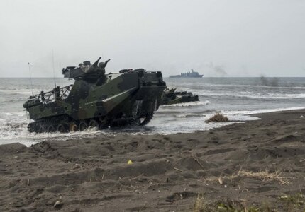 150807-N-SU278-356 JAVA SEA, Indonesia (Aug. 7, 2015) A wave of amphibious assault vehicles (AAV) come ashore during a beach storming exercise as part of Cooperation Afloat Readiness and Training (CARAT) Indonesia 2015. In its 21st year, CARAT is an annual, bilateral exercise series with the U.S. Navy, U.S. Marine Corps and the armed forces of nine partner nations including Bangladesh, Brunei, Cambodia, Indonesia, Malaysia, the Philippines, Singapore, Thailand and Timor-Leste. (U.S. Navy photo by Mass Communication Specialist 2nd Class Will Gaskill/Released)