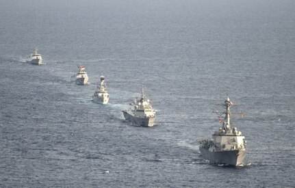 150808-N-UN259-077 JAVA SEA (Aug. 8, 2015) Warships from the U.S. and Indonesian navies participate in a photo exercise during Cooperation Afloat Readiness and Training (CARAT) Indonesia 2015. In its 21st year, CARAT is an annual, bilateral exercise series with the U.S. Navy, U.S. Marine Corps and the armed forces of nine partner nations including Bangladesh, Brunei, Cambodia, Indonesia, Malaysia, the Philippines, Singapore, Thailand and Timor-Leste. (U.S. Navy photo by Mass Communication Specialist 3rd Class Alonzo M. Archer/Released)