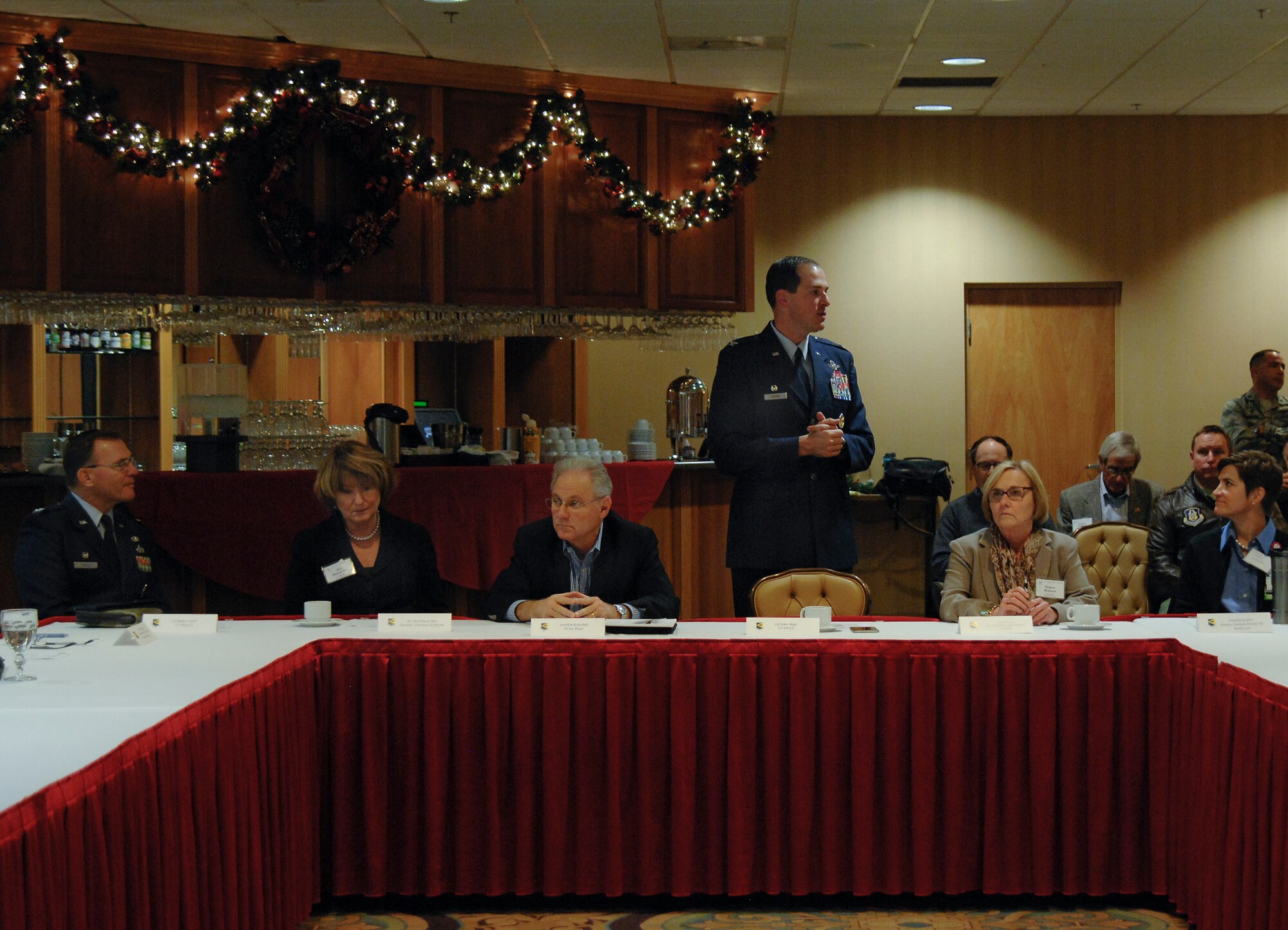 U.S. Air Force Col. James Meger, 355th Fighter Wing commander, speaks to attendees of the Community Partnership Program agreement workshop at Davis-Monthan Air Force Base Air Force, Ariz., Dec. 14, 2015. The 355th FW and 55th Electronic Combat Group leadership signed four agreements with local officials to increase the collaboration between the base and the local community. (U.S. Air Force photo by Staff Sgt. Angela Ruiz/Released) 