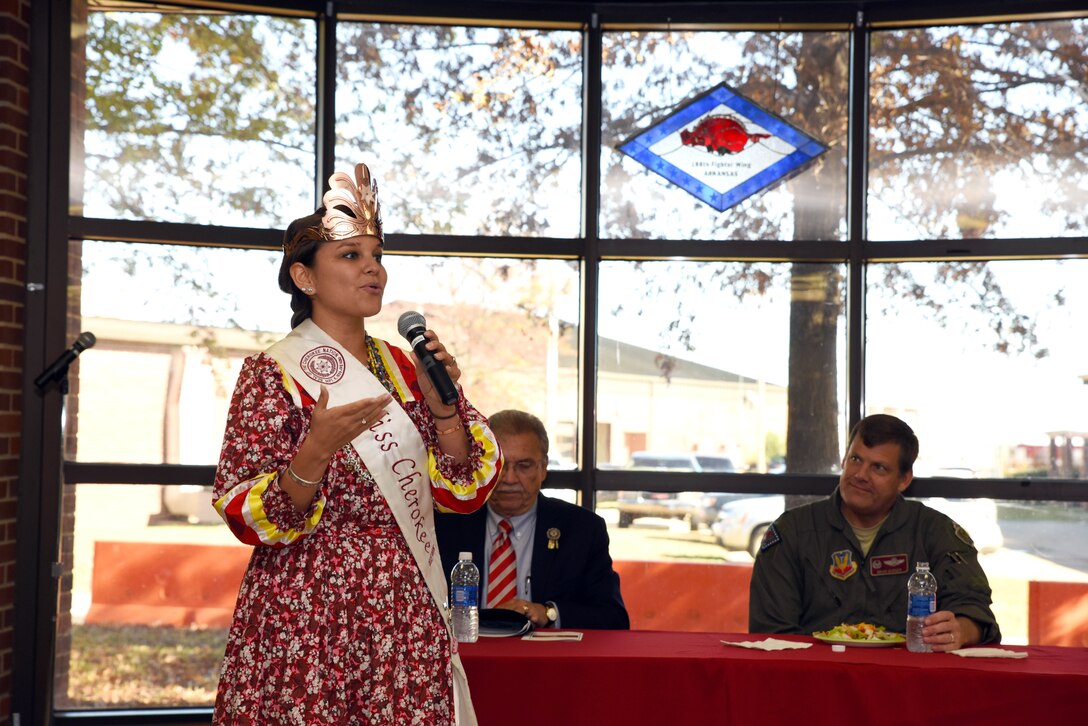 Ja-Li-Si Pittman, 2015-2016 Miss Cherokee, sings a traditional Cherokee song in her native language during a presentation at Ebbing Air National Guard Base, Fort Smith, Ark., for Native American Indian Heritage Month to members of the 188th Wing Nov. 18, 2015. Pittman is currently the vice-president of the Cherokee Nation Tribal Youth Council and her platform has tackled youth needing strong mentors in school. (U.S. Air National Guard photo by Senior Airman Cody Martin/Released)