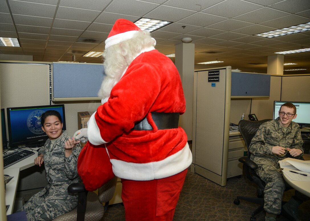Santa visits the 412th Test Wing Financial Management office. (U.S. Air Force photo by Rebecca Amber)