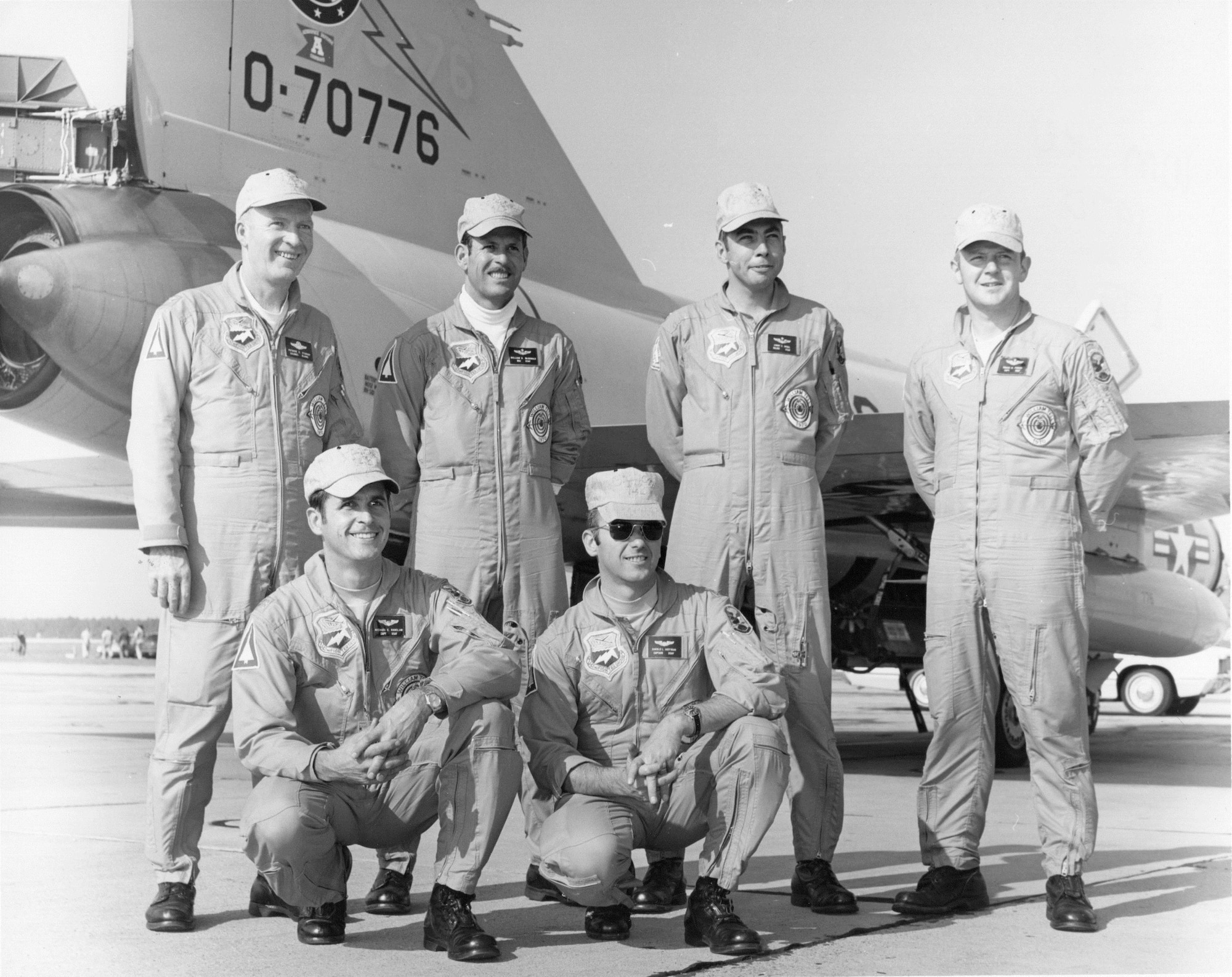 Pilots of the Oregon ANG’s 142nd Fighter Group William Tell 1970 team pose for a photo by the group commander’s F-102 Delta Dagger fighter-interceptor.  Standing, from left to right, are 142nd FG Commander Colonel Patrick E. O’Grady, Major William B. McDonald, Major Jimmy K. Angel and Captain Robert M. Parker.  Kneeling, left to right, are Captain Michael E. Ranslam and Captain Harold L. Hoffman.  (142nd Fighter Wing History Archives)
