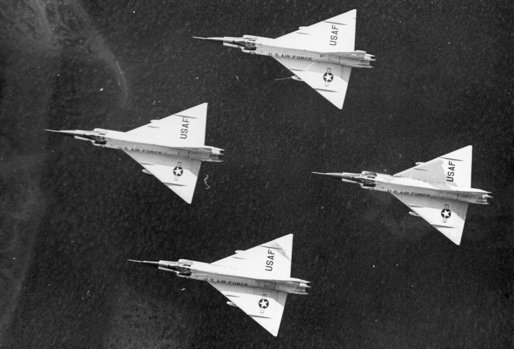 Shadows play across the delta wings and fuselages of a flight of Oregon ANG F-102 Delta Dagger fighter-interceptors, circa 1968.  (142nd Fighter Wing History Archives)
