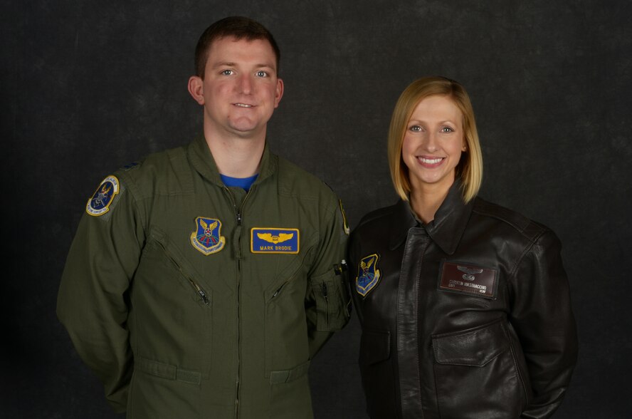 Capt. Mark Brodie, 5th Operations Support Squadron electronic warfare officer, and Capt. Christin Mastracchio, 69th Bomb Squadron flight commander, pose for a photo at Minot Air Force Base, N.D., Dec. 11, 2015. Both Brodie and Mastracchio were recently selected to attend the USAF Test Pilot School. (U.S. Air Force photo/Senior Airman Apryl Hall)