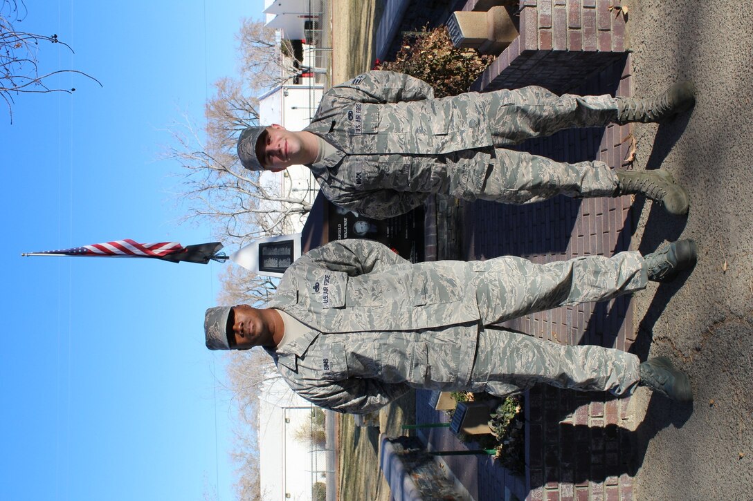 Master Sgt. Robert Sims and Senior Airman Cory Mock from the 912th Aircraft Maintenance Squadron were among several Edwards AFB volunteers who assisted in placing wreaths on 840 graves of veterans at Lancaster Cemetery. (Courtesy photo by Taliah Sims)