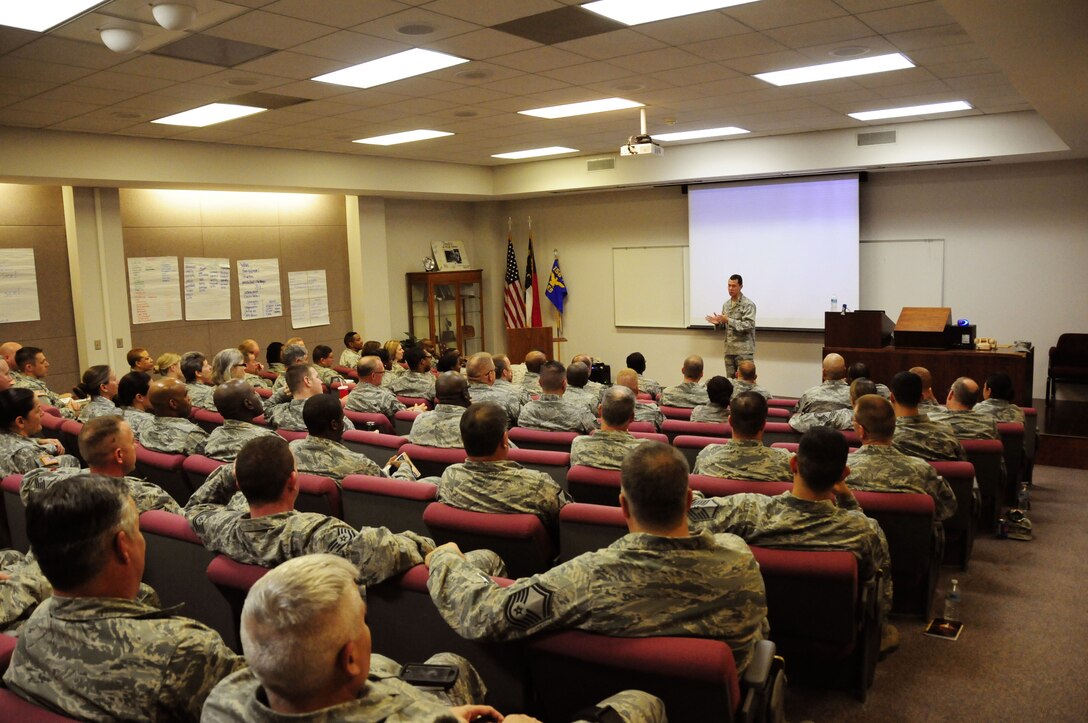 More than 100 Airmen and Soldiers from the North Carolina National Guard attended Four Lenses & Enhanced Human Capital, professional development courses taught at the North Carolina Air National Guard Base, Charlotte Douglas International Airport, Dec. 11, 2015. 
Lt. Col. Kevin Basik, Air Force representative to the Secretary of Defense for Military Professionalism, traveled from Washington D.C. to talk with guardsmen about better ways to communicate, not only as supervisors but strengthen communication and personal interaction with coworkers, family and friends through the skills taught in this class. These courses are designed for military members to help acquire the skills needed to understand human psychology that is currently not provided through traditional Air Force coursework. (U.S. Air National Guard photo by Master Sgt. Patricia F. Moran /Released) 
