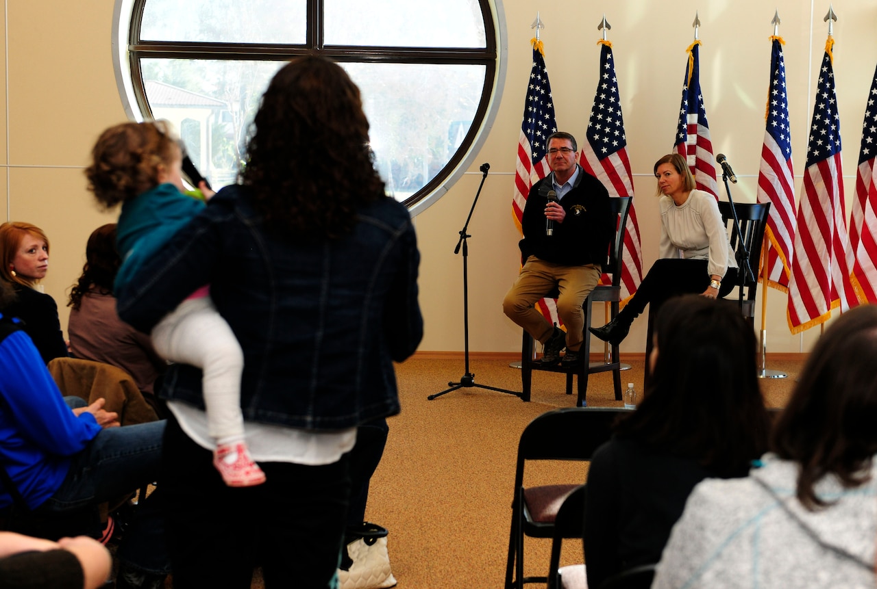 Defense Secretary Ashton B. Carter and his wife, Stephanie, speak with dependents during a dependent only town hall Dec. 15, 2015, at Incirlik Air Base, Turkey. During the town hall, Carter answered questions from dependents about travel restrictions and the on-going authorized voluntary departure as well as a variety of other topics. (U.S. Air Force photo by Senior Airman Krystal Ardrey)