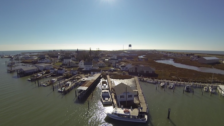 The community of a little more than 700 people located in the middle of the Chesapeake Bay is experiencing erosion, sea-level rise and subsidence. Multiple projects, including an active dredging program and soon to be built jetty, are ongoing or being studied by The Norfolk District, U.S. Army Corps of Engineers, to find ways to combat the effects of these elements. (U.S. Army photo/Patrick Bloodgood)