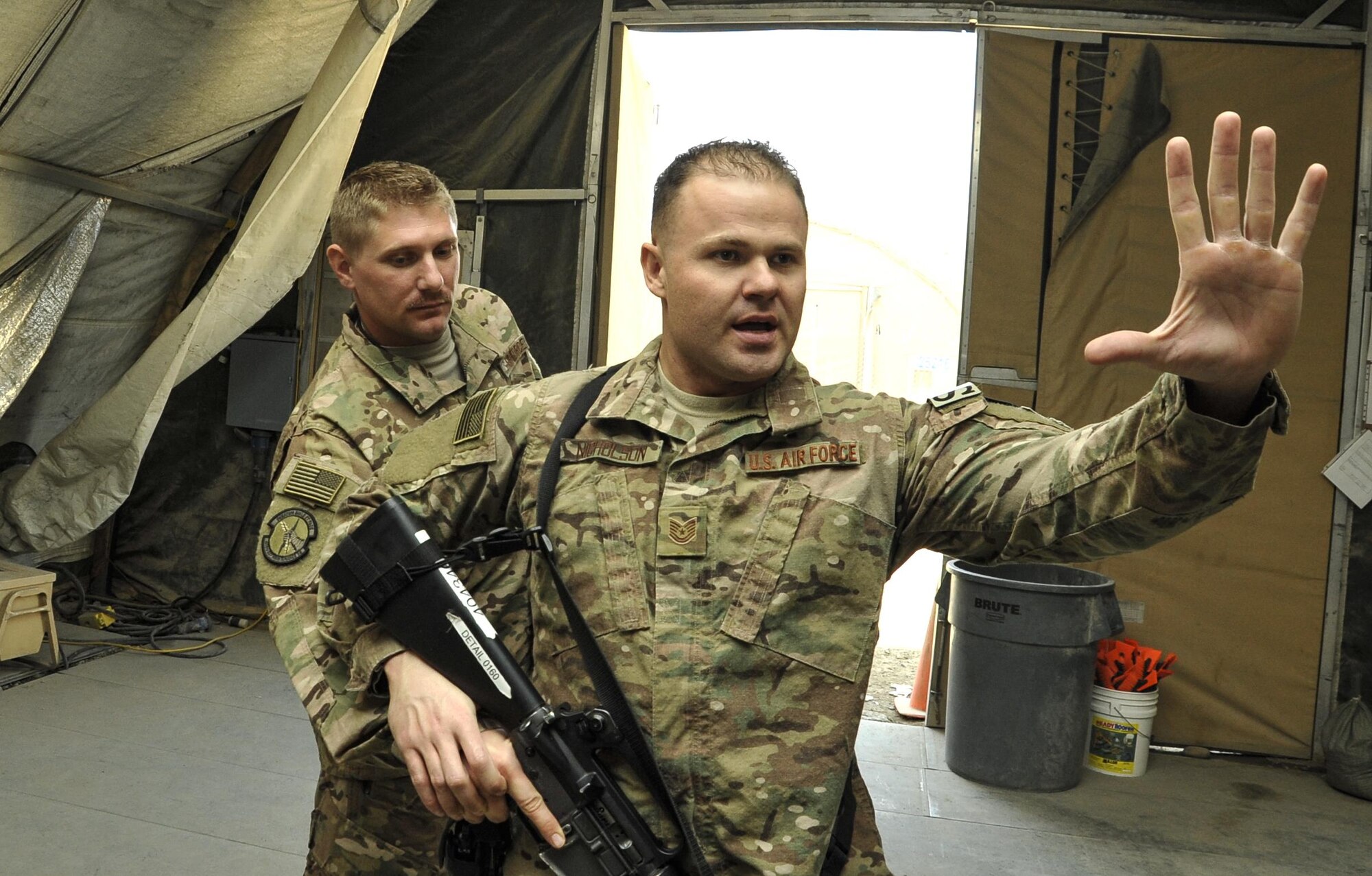 Tech. Sgt. Jason Nicholson, 455th Expeditionary Security Forces Squadron Check Six instructor for Afghanistan, instructs a Check Six class on how to react if someone tries to take your weapon system at Bagram Airfield, Afghanistan Dec. 3, 2015. Since the training was implemented two years ago, no active shooter incident involving Airmen has taken place in the Afghanistan area of responsibility.  (U.S. Air Force photo by Tech. Sgt. Nicholas Rau)