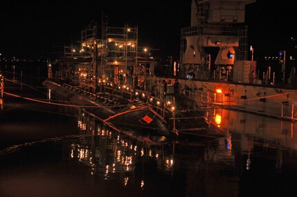 SAN DIEGO (Nov. 1, 2011) - Sailors from USS San Francisco (SSN 711) and dry dock Arco (ARDM 5) make preparations for the undocking of the Los Angeles-class, fast-attack submarine from the floating dry dock.  San Francisco has been in dry dock for four months for scheduled maintenance and repairs.  Lt. Cdmr. Mack Schmidt, Arco's Commanding Officer, said, "This type of availability normally takes a little over nine months. However, team San Francisco, Arco, and Portsmouth Naval Shipyard got the submarine in and out of dry dock in four months - a record." (U.S. Navy photo by Aviation Machinist's Mate Airman Amanda Huntoon/Released)