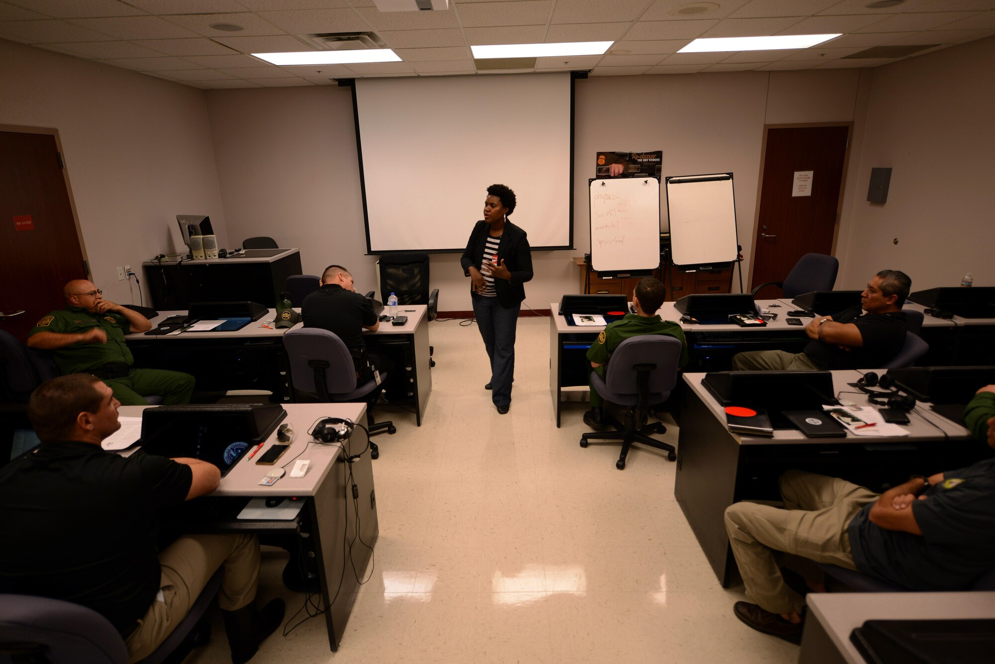 Aaliyah Negley, 47th Flying Training Wing community support coordinator, instructs a class on suicide prevention at the U.S. Customs and Border Protection Del Rio Border Patrol Sector in Del Rio, Texas, Sept. 21, 2015. The training covered the pillars of resiliency, ways to cope with stress, how to overcome overwhelming challenges, and how to look for the signs of depression or suicidal thoughts. (U.S. Air Force photo by Airman 1st Class Ariel D. Partlow) (Released)