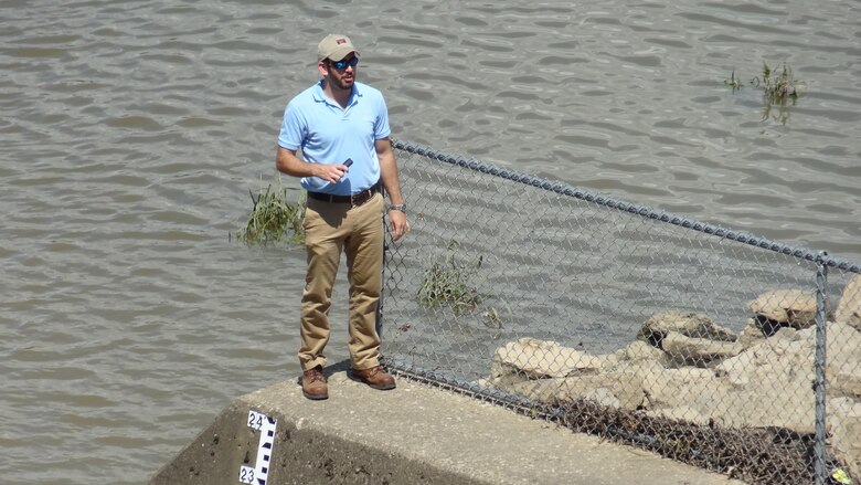 Risk cadre member Calvin Barefoot inspects spillway from an upstream training wall at the Town Bluff Dam in Texas for the Fort Worth District June 2013.