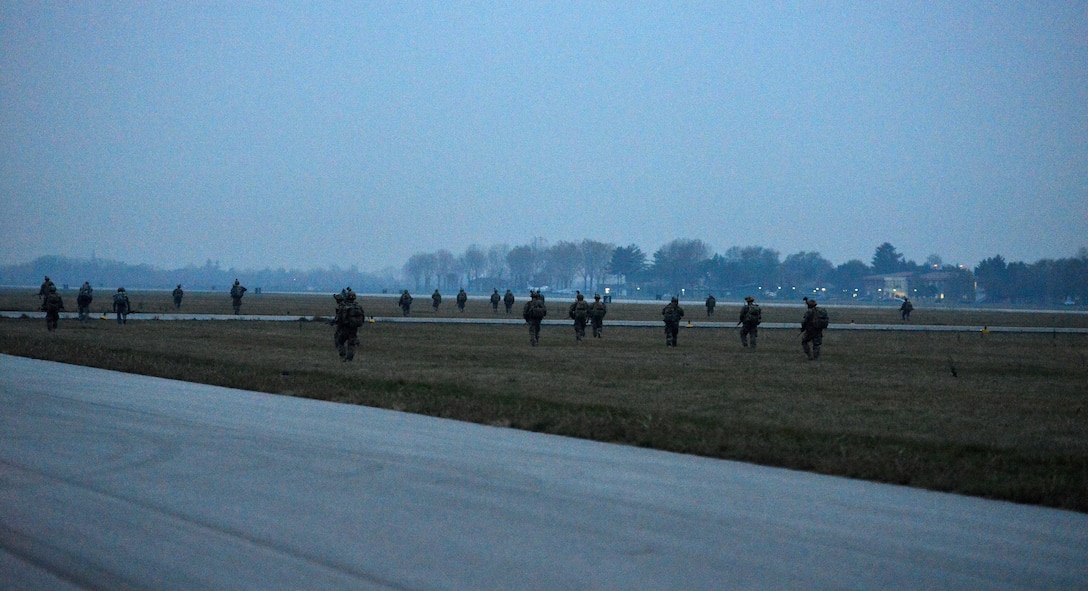 U.S. soldiers begin a patrol mission during Exercise Rock Nemesis at Rivolto Air Base, Italy, Dec. 4, 2015. U.S. Army photo by Paolo Bovo