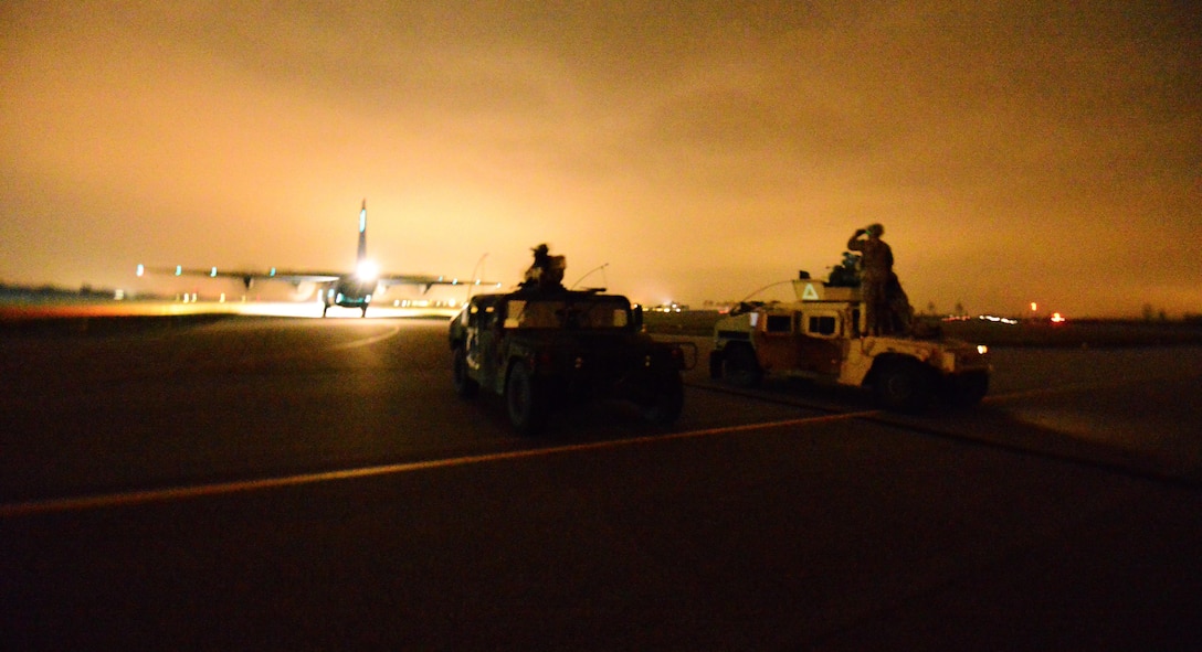 U.S. soldiers establish a security perimeter around the airfield during Exercise Rock Nemesis at Rivolto Air Base, Italy, Dec. 4, 2015. U.S. Army photo by Paolo Bovo