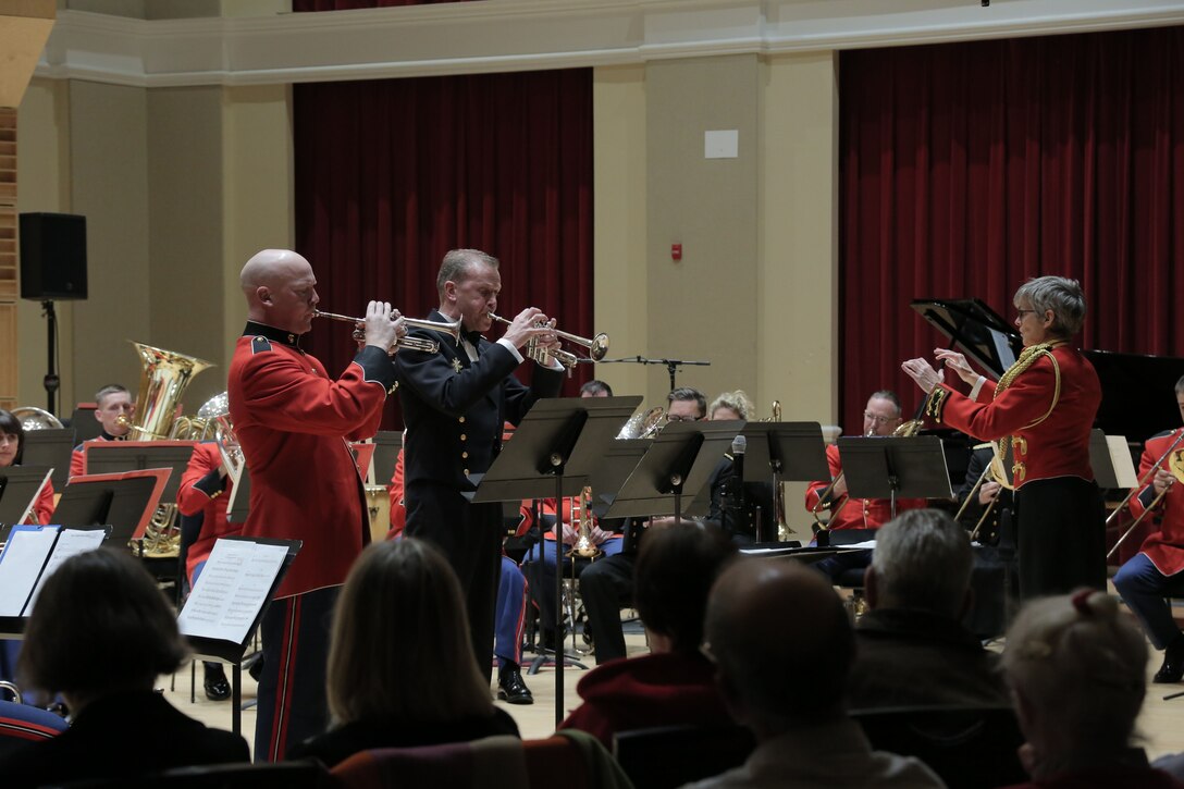 "The President's Own" United States Marine Band and the Danish military band Slesvigske Musikkorps presented a joint holiday concert on Dec.15, 2015, in John Philip Sousa Band Hall at the Marine Barracks Annex in Washington, D.C. The program was conducted by Maj. Michelle A Rakers and Dr. Peter Ettrup Larsen. (U.S. Marine Corps photo by Gunnery Sgt. Amanda Simmons/released)
