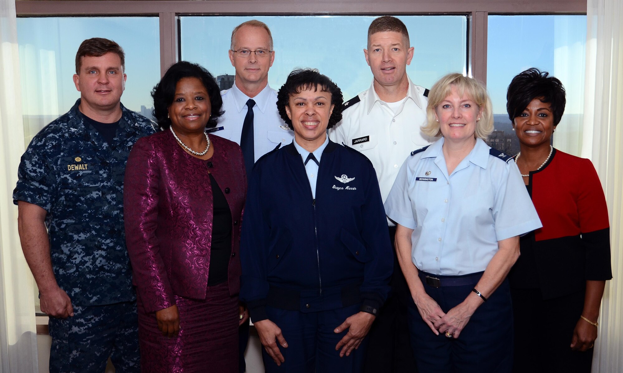 Navy Capt. Chip DeWalt, Navy Operational Support Center commander; Shan Cooper, Lockheed Martin Aeronautics Company vice president and general manager; Air Force Col. Steve Parker, 94th Airlift Wing commander; Air Force Maj. Gen. Stayce Harris, 22nd Air Force commander; Army Brig. Gen. Joe Jarrard, Georgia National Guard adjutant general; Air Force Col. Sheri Bennington, Defense Contract Management Agency – Lockheed Martin-Marietta commander; and Myra Tate, DCMA– Lockheed Martin-Marietta deputy director; pose for a photo at the Georgian Club in Atlanta, Ga., Dec. 15, 2015. The leaders met to discuss issues pertinent to Dobbins Air Reserve Base and their agencies’ partnerships. (U.S. Air Force photo/Brad Fallin)