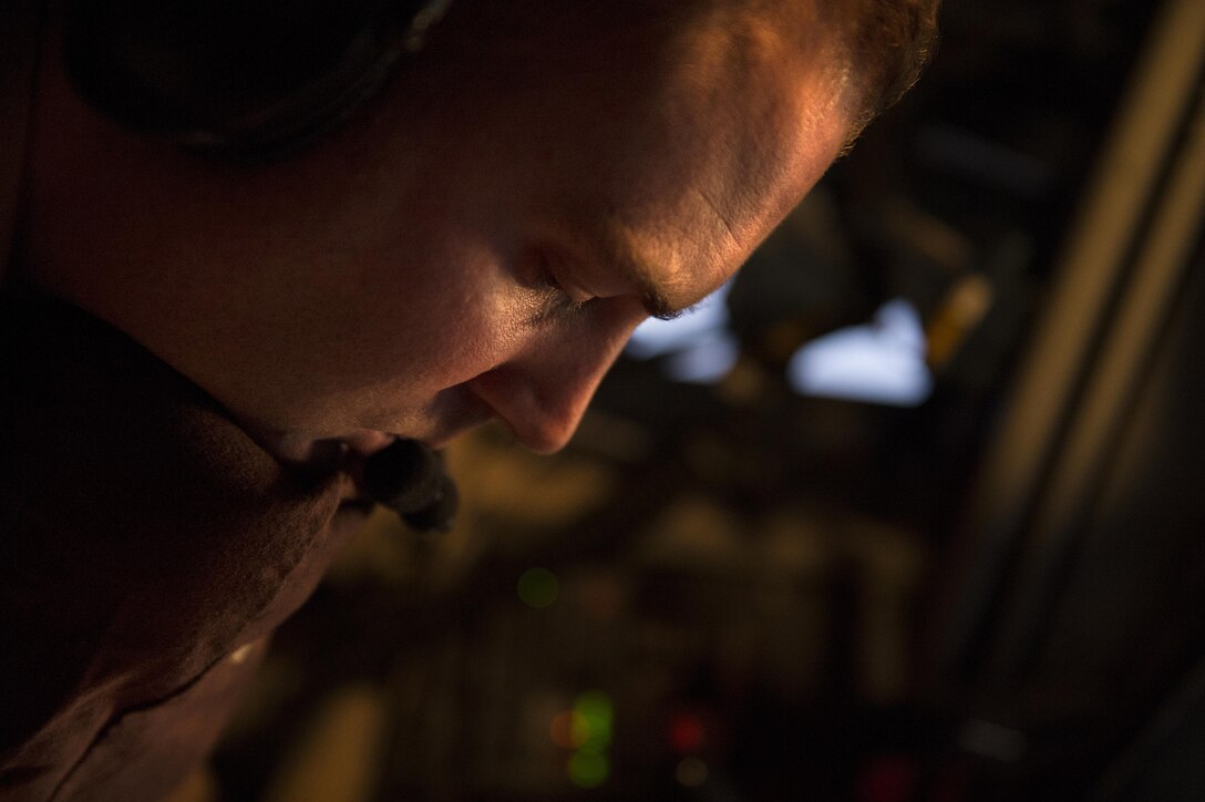 U.S. Air Force Tech. Sgt. Scott Nagel refuels an F-18 from the Royal Canadian air force in support of Operation Inherent Resolve over Southwest Asia, Dec. 4, 2015. Nagel is a boom operator assigned to the 340th Expeditionary Air Refueling Squadron, is deployed from the 171st Air Refueling Wing in Pennsylvania. U.S. Air Force photo by Tech. Sgt. Nathan Lipscomb
