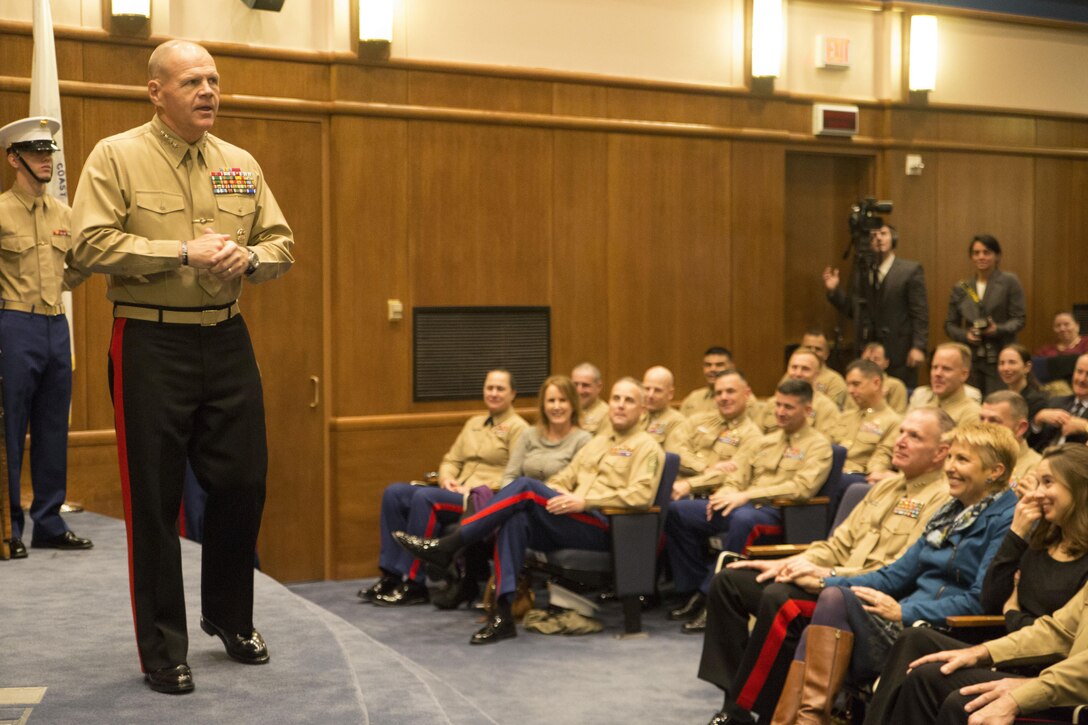The Commandant of the Marine Corps, General Robert B. Neller, addresses the audience during the Marine Corps Recruiting Command change of command ceremony at the Gray Research Center at Marine Corps Base Quantico, Va., Dec. 17, 2015. During his speech, Neller thanked Lt. Gen. Mark A. Brilakis for his years of service to the command and congratulated Brig. Gen. Paul Kennedy on taking command of MCRC. 
