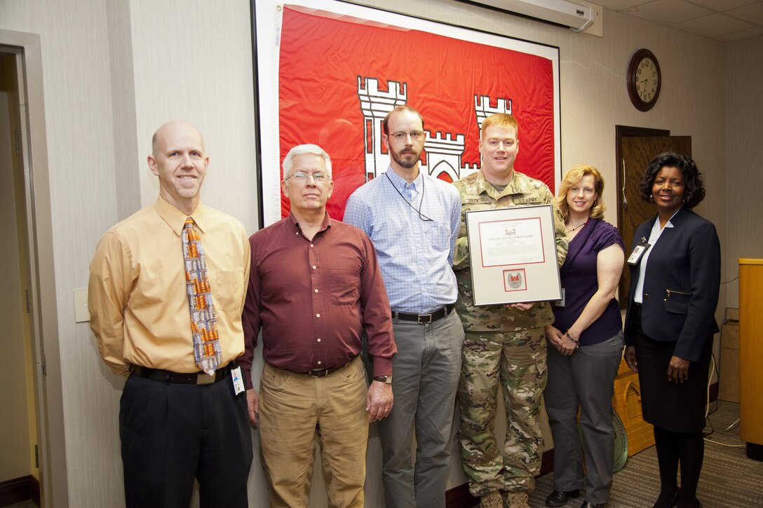 Chris Inlow, Scott Giller, Jason Meyer, Lisa Taylor and Karla Wright were presented with a certificate of appreciation by Louisville District Commander Col. Christopher Beck (center) at a meeting at the Mazzoli Federal Building Dec. 15, 2015.