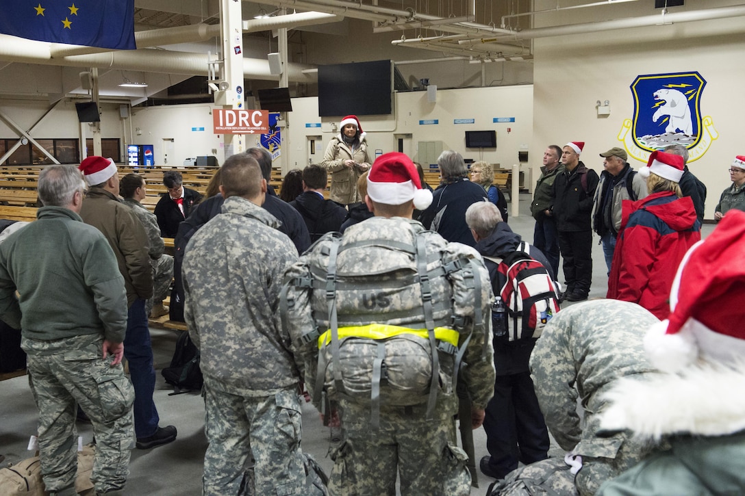 Service members and volunteers from approximately 30 groups and organizations came together to bring holiday cheer during Operation Santa Claus to the village of St. Mary's, Alaska, Dec. 5, 2015. This year marks the 59th year of the program, which serves to bring Christmas to underserved, remote villages across Alaska each year. U.S. Air Force photo by Alejandro Pena