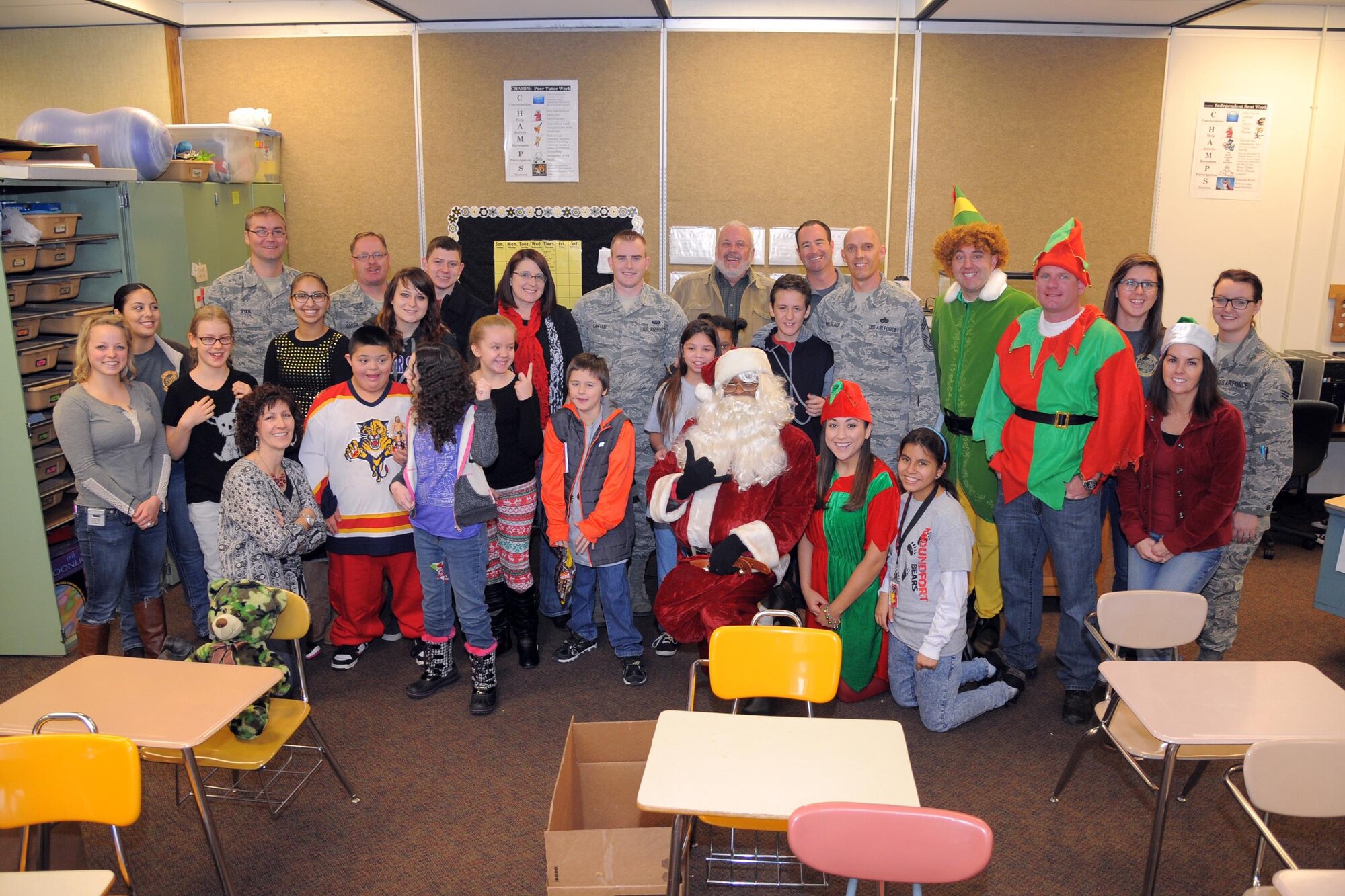 Reservists from the 419th Fighter Wing hosted a Christmas party for students with special needs at Mound Fort Junior High in Ogden Dec. 16. (U.S. Air Force photo/Todd Cromar)