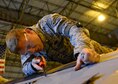 Maintainers with the 436th Maintenance Squadron perform a major inspection on a C-5M Super Galaxy in the isochronal maintenance dock Dec. 2, 2015, at Dover Air Force Base, Del. (U.S. Air Force photo/Senior Airman William Johnson)