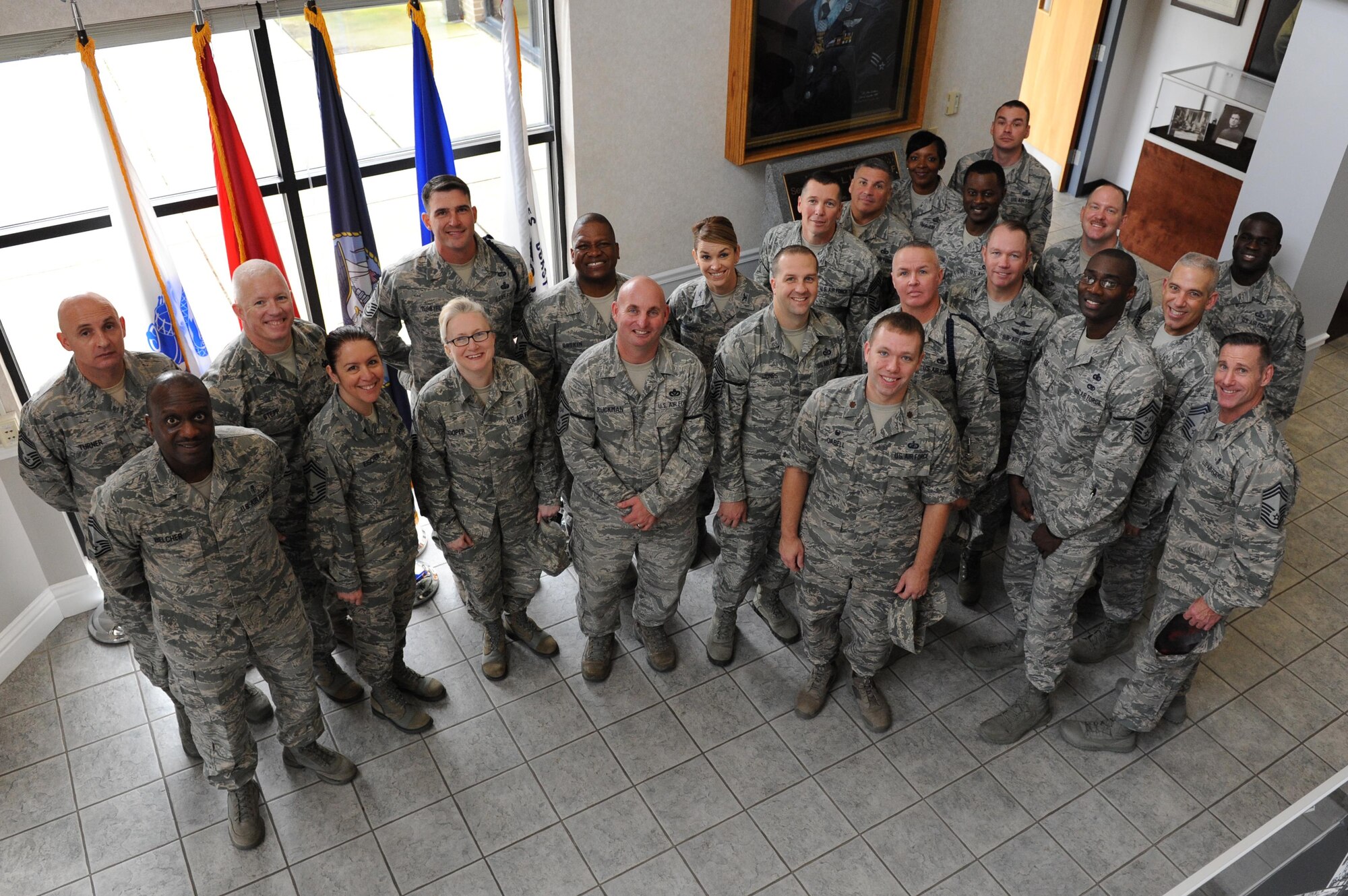 Keesler leaders and chief master sergeants pose for a photo with Keesler’s six senior master sergeants that were selected for promotion to the rank of chief master sergeant at the Levitow Training Support Facility Dec. 17, 2015, Keesler Air Force Base, Miss. The selectees were greeted at their offices by Keesler leadership and chief master sergeant. (U.S. Air Force photo by Kemberly Groue)