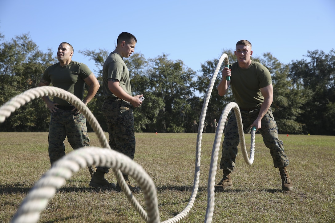 Marines with Marine Aviation Logistics Squadron-31 compete in a series of events during a field meet aboard Marine Corps Air Station Beaufort, S.C., Dec. 11, 2015. The squadron field meet was held to improve unit cohesion, build camaraderie, improve physical fitness, and build Esprit de Corps. 