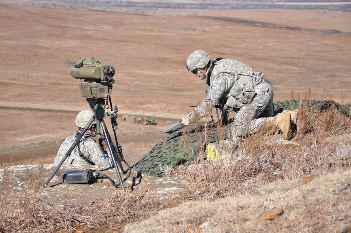 U.S. Army personnel assigned to the 1st Squadron, 4th Cavalry, 1st Infantry Division set up an observation point to support close-air support during a SMOKEX exercise about 10 miles south of Salina, Kan. SMOKEX, a large-force exercise, brings together joint forces and more than 10 aircraft platforms from neighboring areas, all supporting B-2 objectives for dynamic targeting. (U.S. Air Force photo by Susan Garcia) 