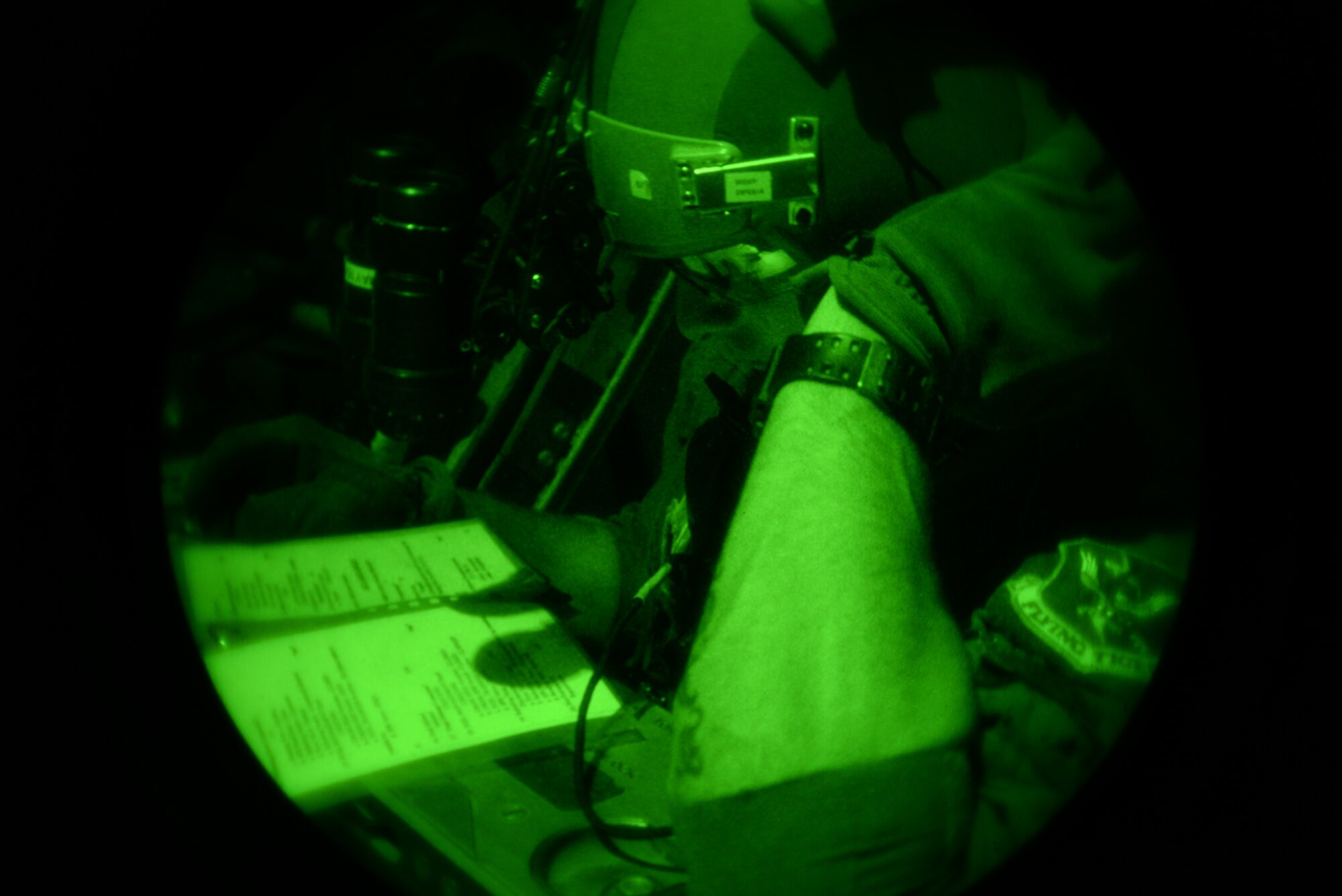 U.S. Air Force Staff Sgt. Russell Bickel, 79th Rescue Squadron loadmaster, reviews his forward area refueling point checklist at Davis-Monthan Air Force Base, Ariz., Dec. 9, 2015.  The FARP training was conducted after heavy equipment airdrops at Fort Huachuca, Ariz., with the 563rd Operation Support Squadron. (U.S. Air Force photo by Airman 1st Class Mya M. Crosby/Released)
