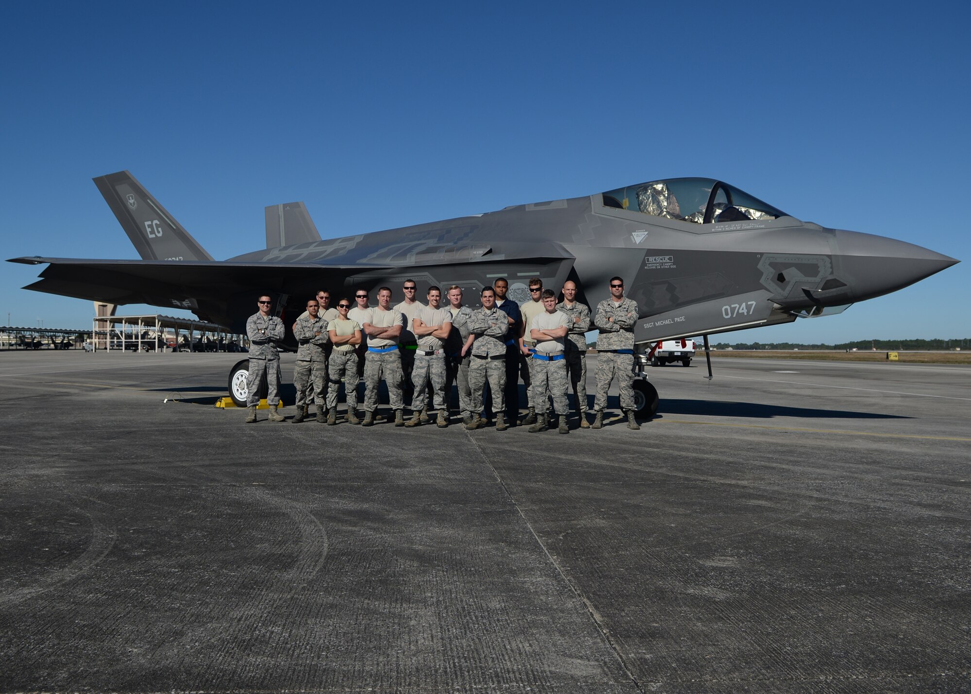 Airmen from Eglin Air Force Base, Fla., stand in front of an F-35 Lightning II Dec. 15 at the Tyndall AFB flightline. Team Eglin Airmen came to Tyndall in support of the Checkered Flag 16-1 exercise, a large-force exercise that simulates employment of a large number of aircraft from a simulated deployed environment. (U.S. Air Force photo by Senior Airman Sergio A. Gamboa/Released) 
