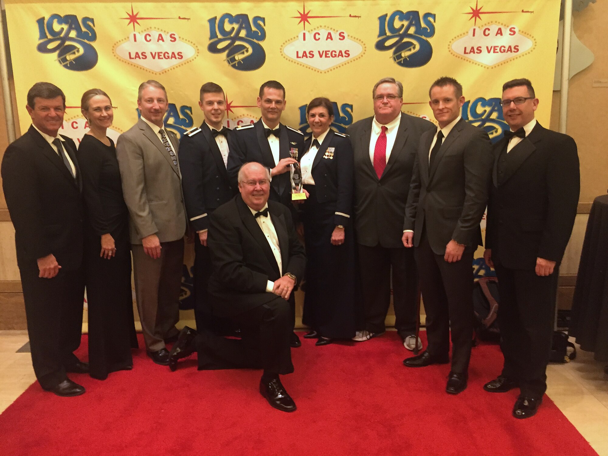 2015 Thunder of Niagara Air Show Organizers pose for a photo at the Chairman’s Banquet during the 2015 International Council of Air Shows on Dec. 08, 2015 in Las Vegas, Nevada. Niagara Falls Air Reserve Station won the Dick Schram Memorial Community Relations Award, presented each year to the military base which, in planning and implementing its air show, not only exhibits traditional community relations as it considers the needs of its civilian neighbors, but sets new standards of excellence in this area by including its community in the planning, execution and rewards of the event. (Courtesy Photo)