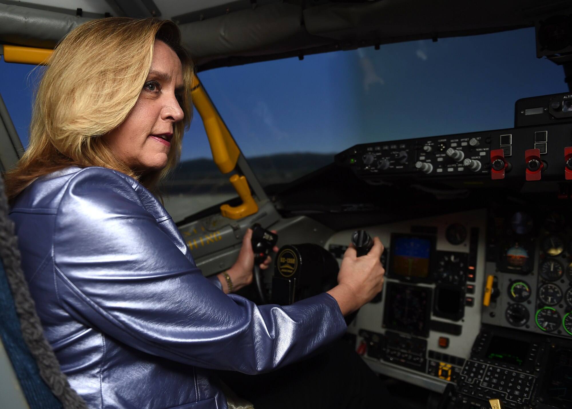Secretary of the Air Force Deborah Lee James works the controls of a KC-135R Stratotanker simulator Dec. 16, 2015 during her visit to Grissom Air Reserve Base, Ind. During her visit she learned first-hand the mission and capabilities of the Hoosier Wing. (U.S. Air Force photo/Tech. Sgt. Benjamin Mota)