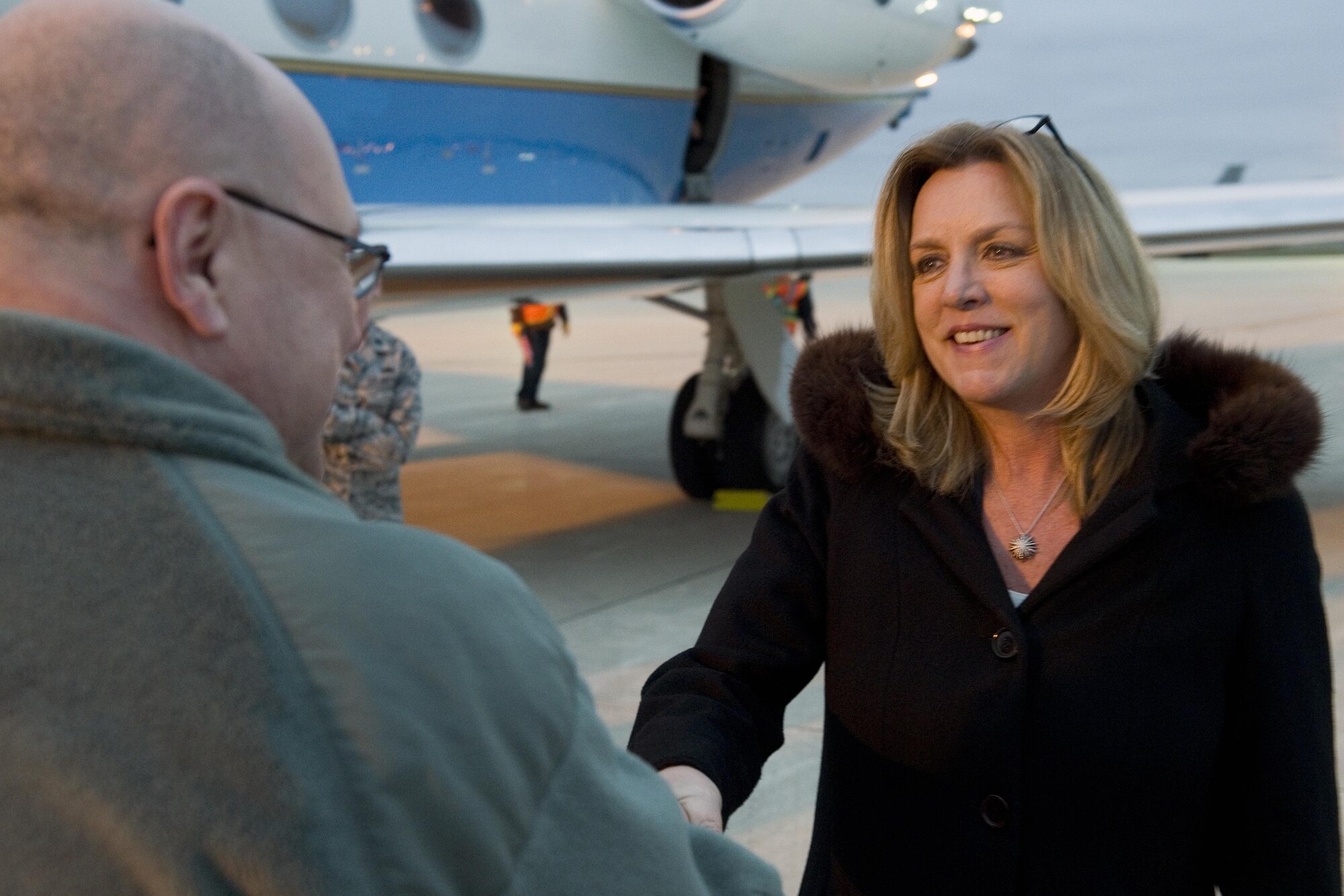 Secretary of the Air Force Deborah Lee James is greeted by leadership from the 434th Air Refueling Wing at Grissom ARB, I.N, Dec. 15, 2015. During the visit, the Secretary learned about the base's history and gained a more in-depth understanding of Grissom's mission capabilities and the local communities that support the support. (U.S. Air Force photo/Senior Airman Andrew Crawford)