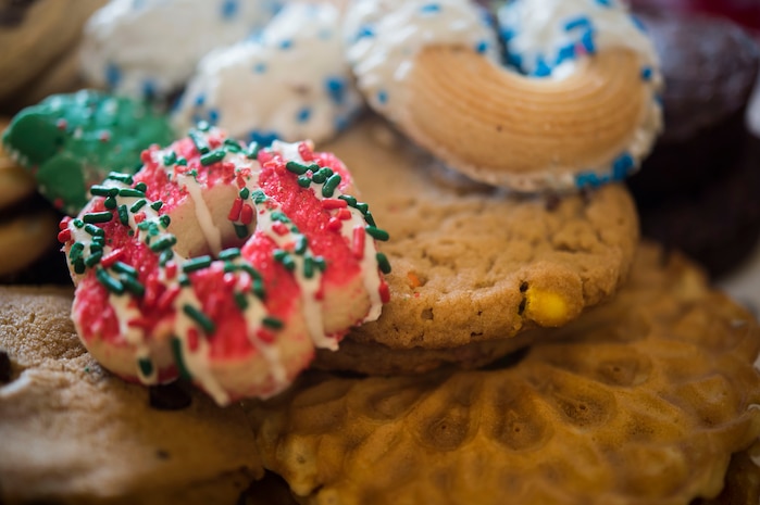 A platter of cookies is put together by members of the Team Charleston Spouses Club Dec. 16, 2015, during this year’s “Operation Cookie Drop” at Joint Base Charleston, S.C. More than 5,000 freshly baked cookies were donated. The cookies were distributed to active duty service members who work overnight shifts throughout the air base and weapons station. (U.S. Air Force photo/Senior Airman Jared Trimarchi) 