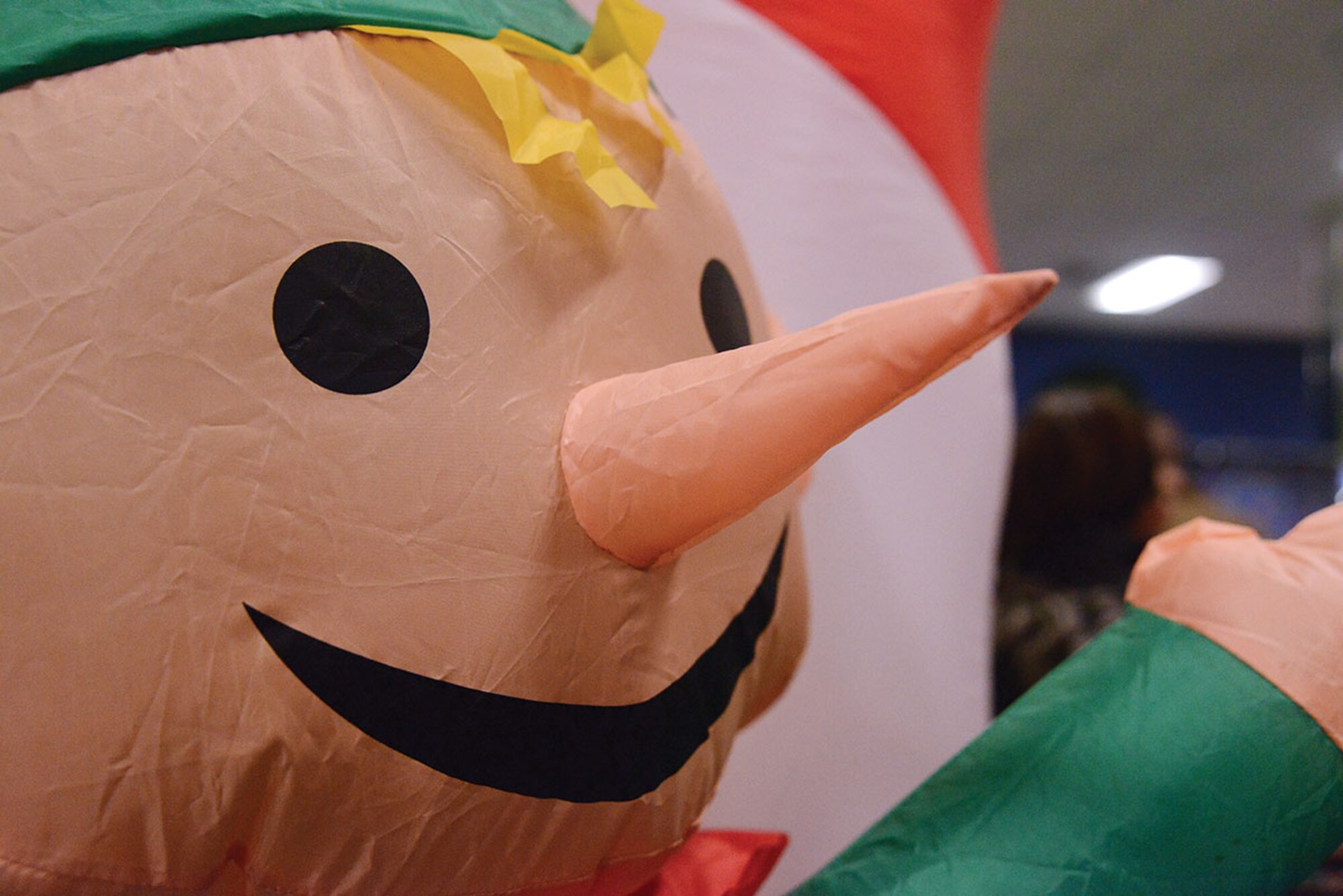 An inflatable elf welcomes families to Breakfast with Santa at the Arctic Oasis at Joint Base Elmendorf-Richardson, Alaska, Dec. 12, 2015. The breakfast consisted of pancakes, bacon, apples, cereal and syrup.(U.S. Air Force photo by Airman 1st Class Christopher R. Morales)