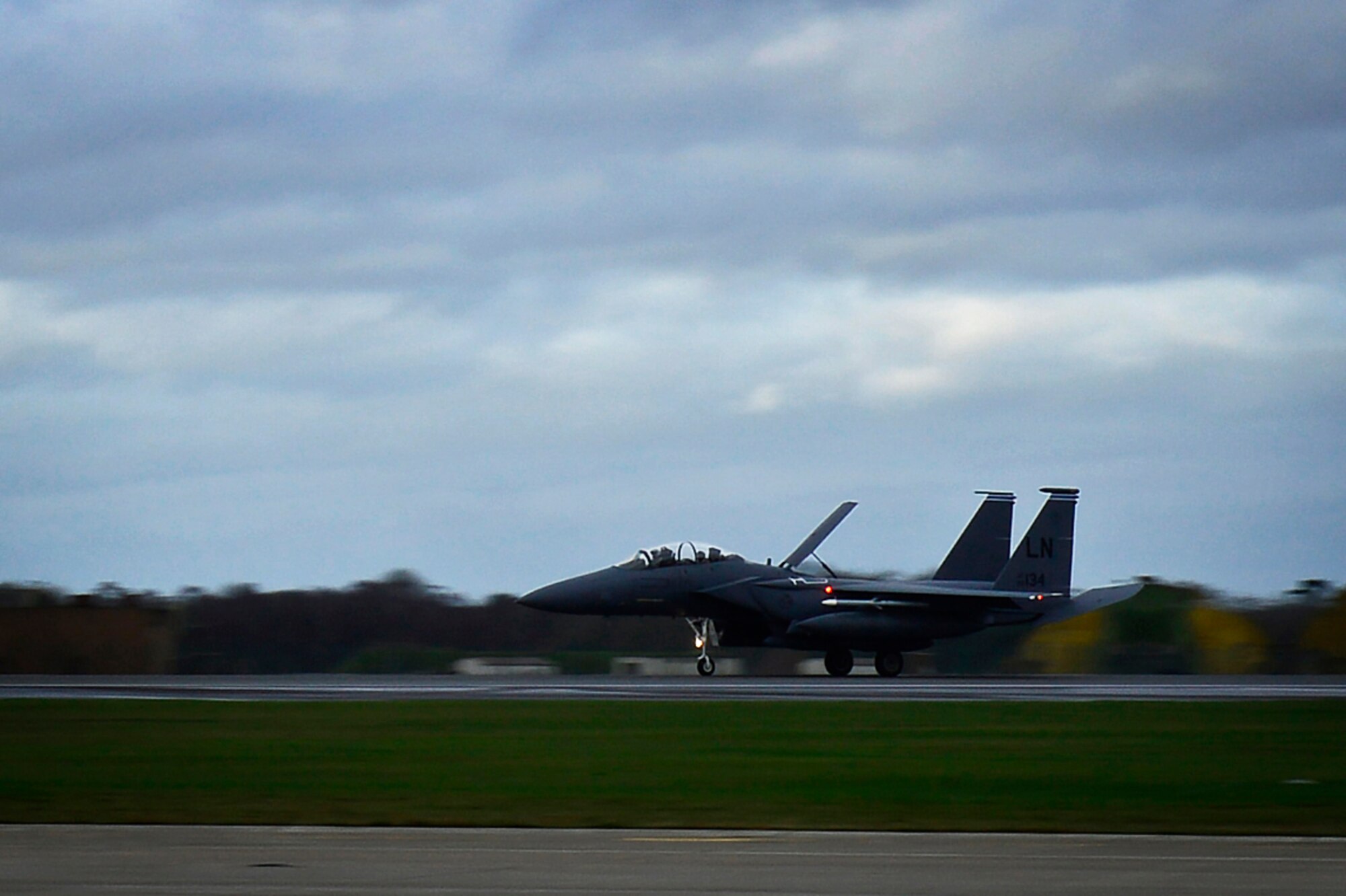 A U.S. Air Force F-15E Strike Eagle from the 492nd Fighter Squadron lands at Royal Air Force Lakenheath, England, after a deployment to Incirlik Air Base, Turkey, Dec. 16, 2015. Aircraft from the 48th Fighter Wing deployed to Incirlik Air Base, Turkey, conduct counter-ISIL operations in Syria and Iraq as part of Operation Inherent Resolve. This dual-role fighter jet is designed to perform air-to-air and air-to-ground missions in all weather conditions. (U.S. Air Force photo/Airman 1st Class Erin R. Babis)