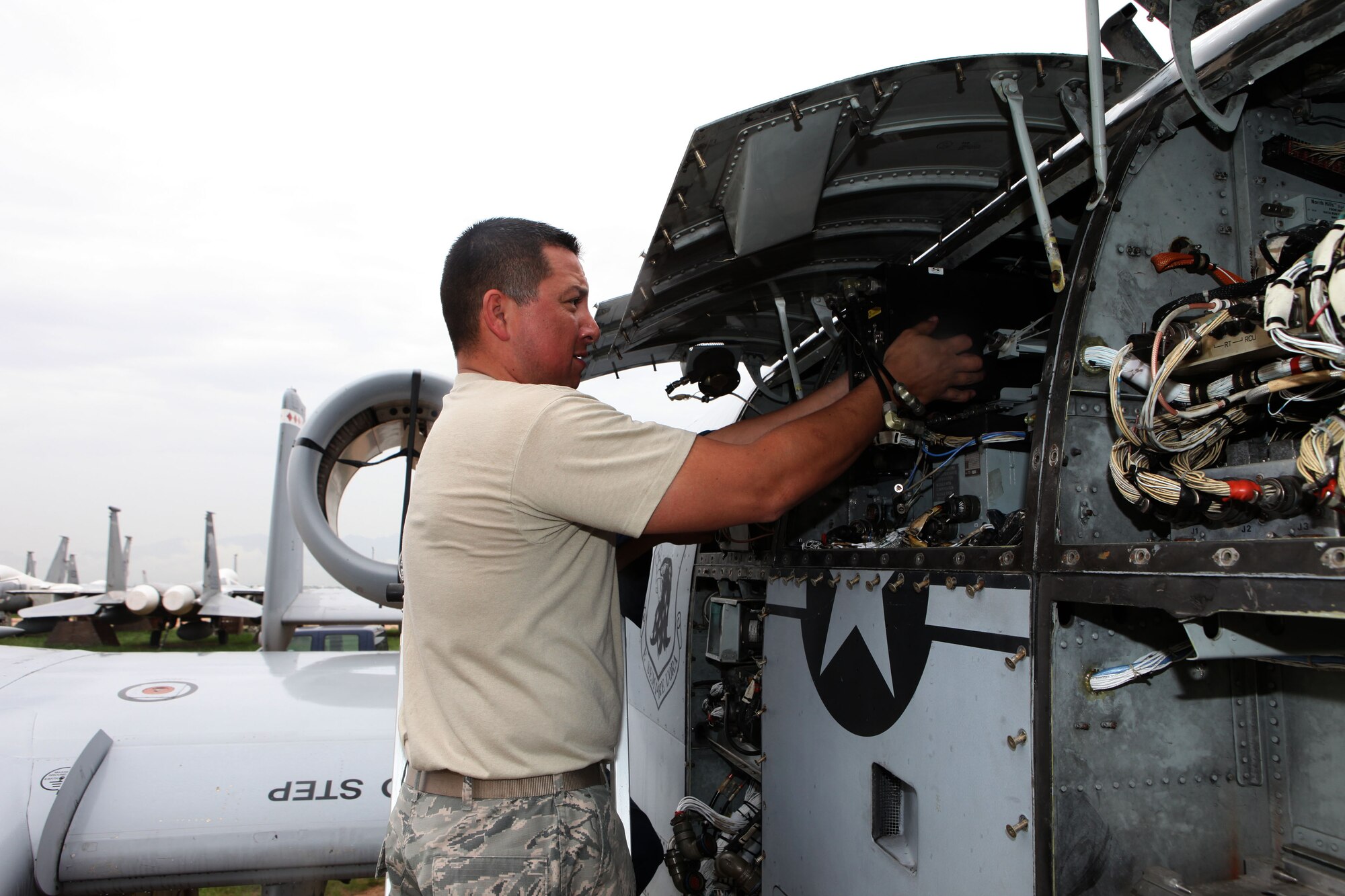 Tech. Sgt. Anthony Aguillon, an electrician assigned to the 355th Fighter Wing's Maintenance Group, removes one of 30 components identified by Hill AFB for use in their Software Integration Lab. (U.S. Air Force photo by Terry Pittman)
