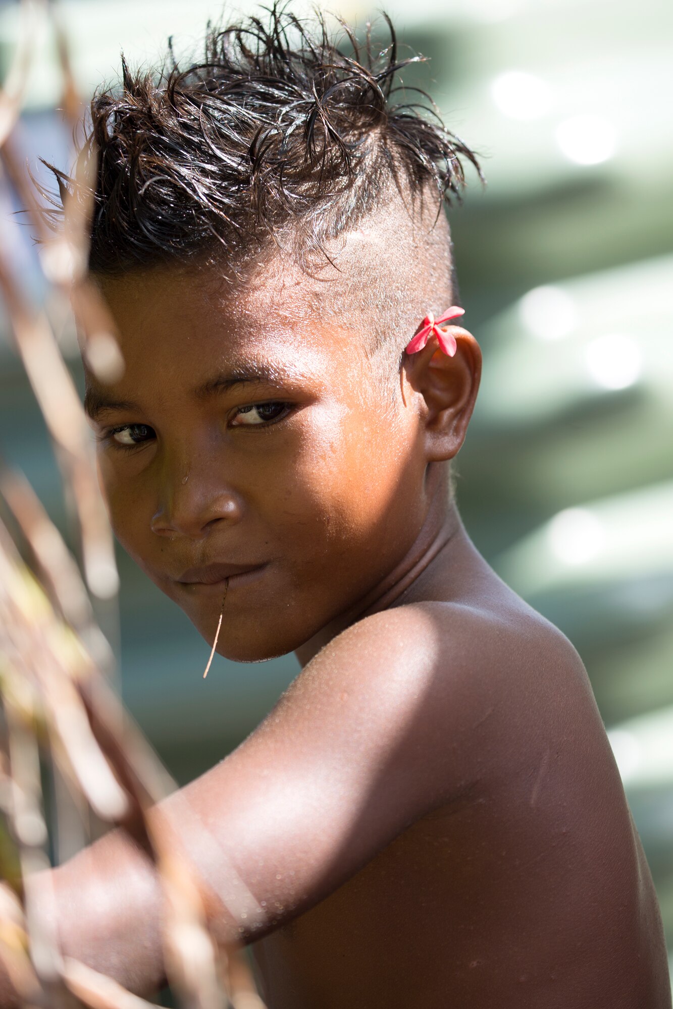 A child on Fais Island, Federated States of Micronesia, Dec. 8, 2015. A C-130 Hercules from the 36th Airlift Squadron delivered more than 800 pounds of supplies to Fais island during Operation Christmas Drop 2015. This year marks the first trilateral execution that includes air support from the Japan Air-Self Defense force and the Royal Australian Air Force. (U.S. Air Force photo by Osakabe Yasuo/Released)