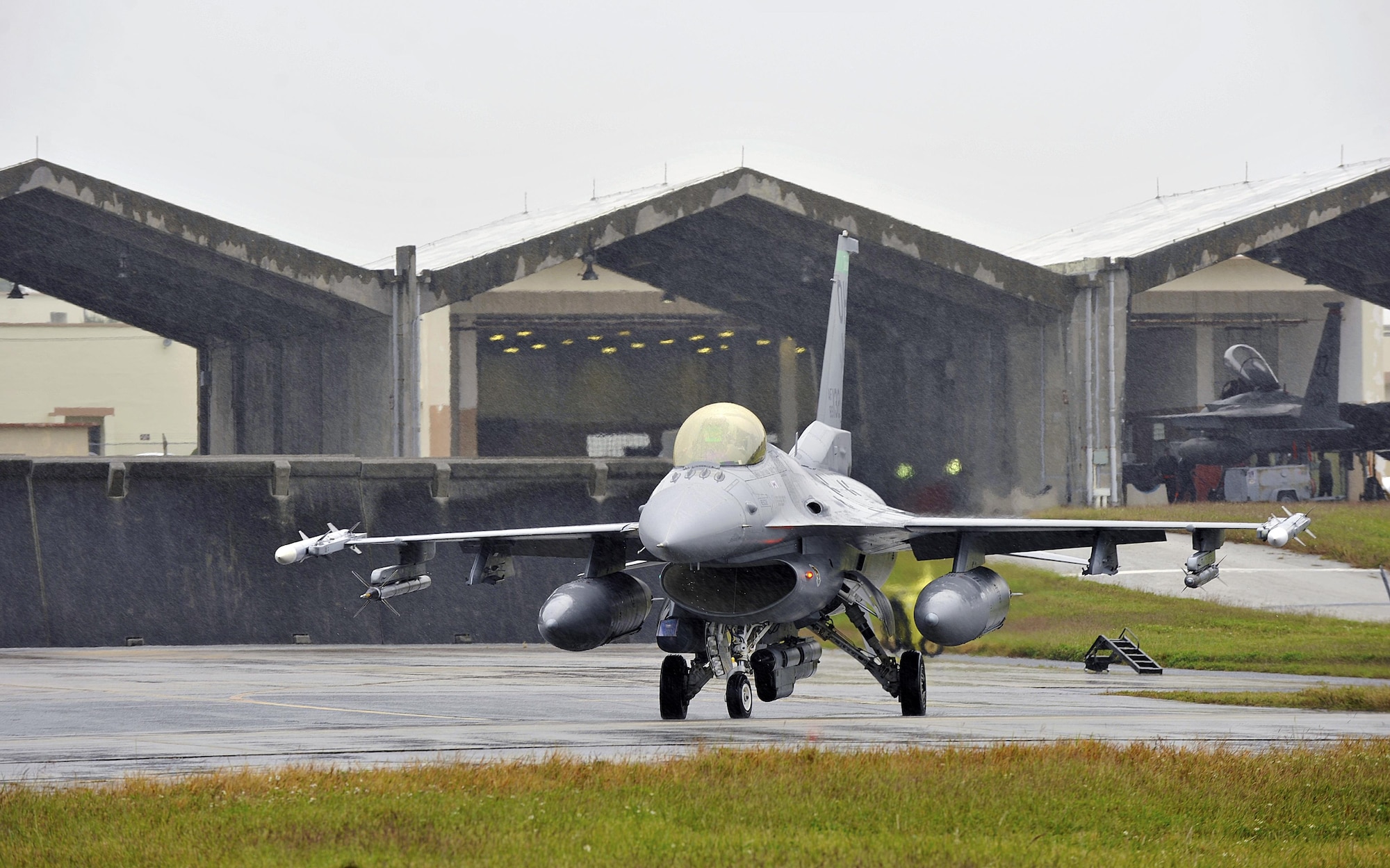 A U.S. Air Force F-16 Fighting Falcon from the 125th Expeditionary Fighter Squadron taxis for takeoff as part of the U.S. Pacific Command Theater Security Package Dec. 15, 2015, at Kadena Air Base, Japan. The 125th EFS, located at Tulsa Air National Guard Base, Okla, deployed to Kadena to provide PACOM with forces capable of a variety of operations including disaster relief, global situational awareness, combating piracy, active defense and power projection. (U.S. Air Force photo by Naoto Anazawa)