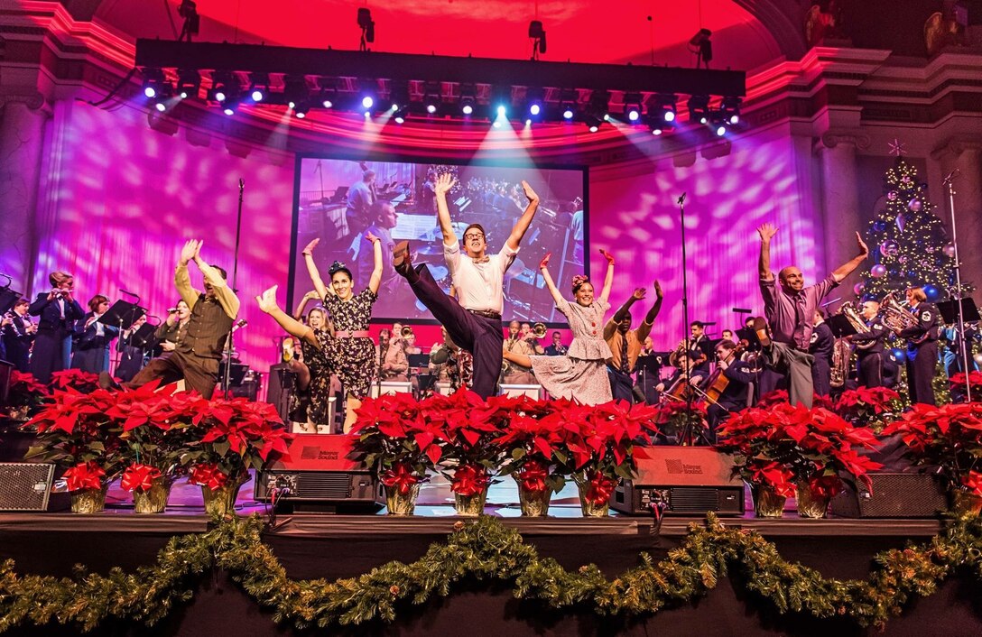 A dance troupe from New York City joined The United States Air Force Band for the Spirit of the Season holiday concert at DAR Constitution Hall.  The dancers were center stage during a special concert performance of the World War II Flashback, also featuring The Airmen of Note. (U.S. Air Force Photo by Senior Master Sgt Bob Kamholz/released)